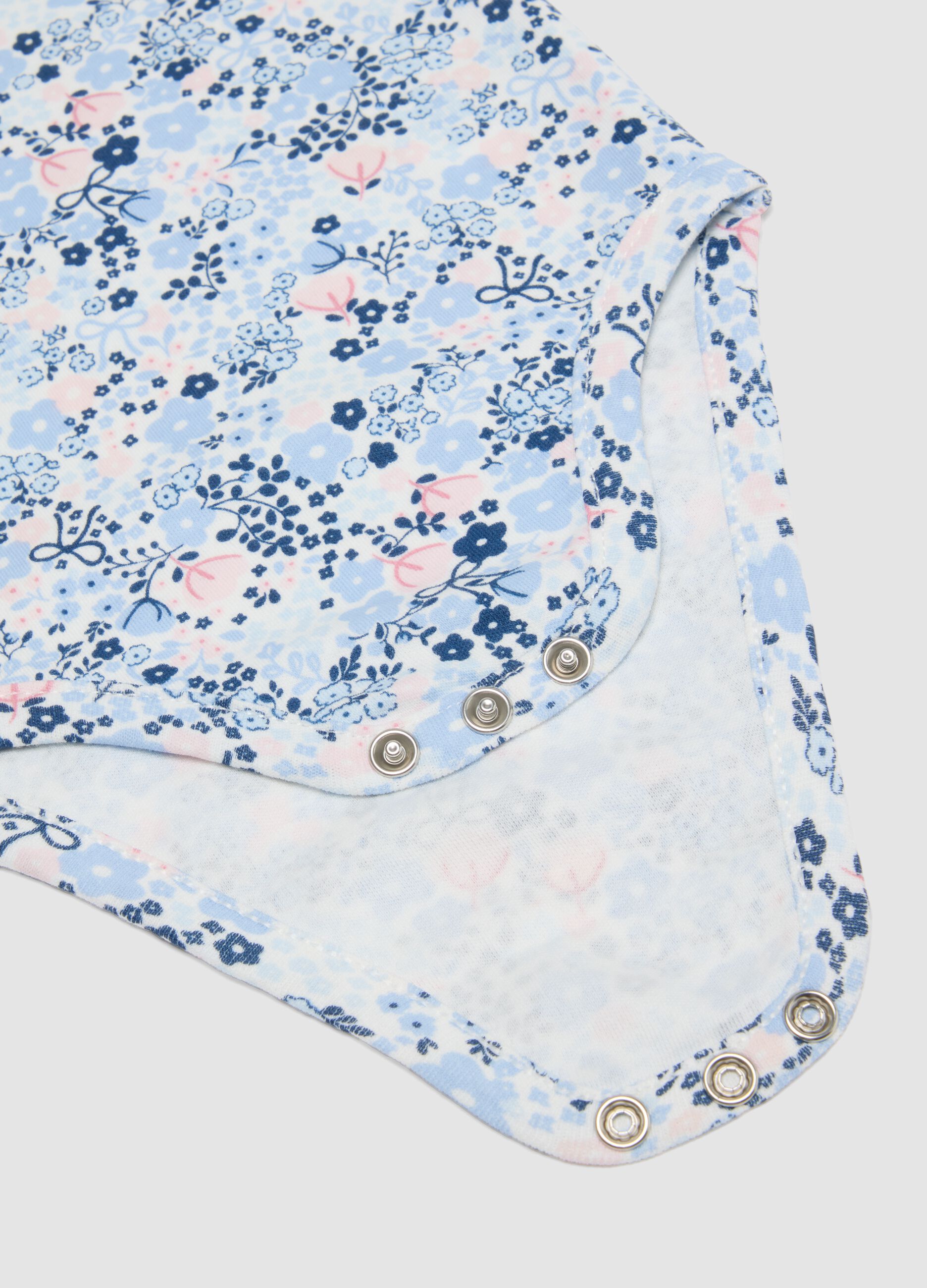 Tripack di body multicolor in puro cotone per neonata