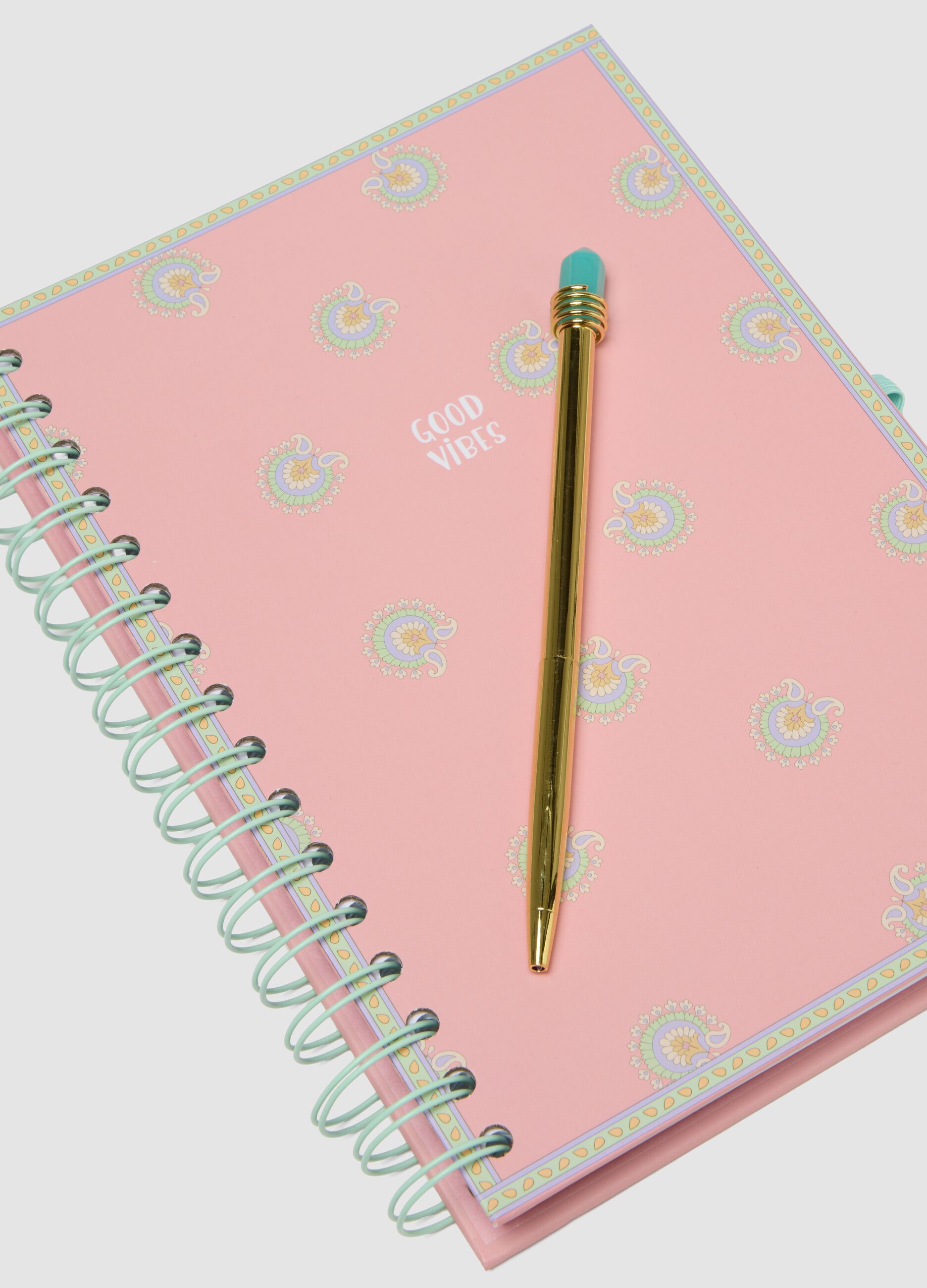 Pink spiral notebook and pen set
