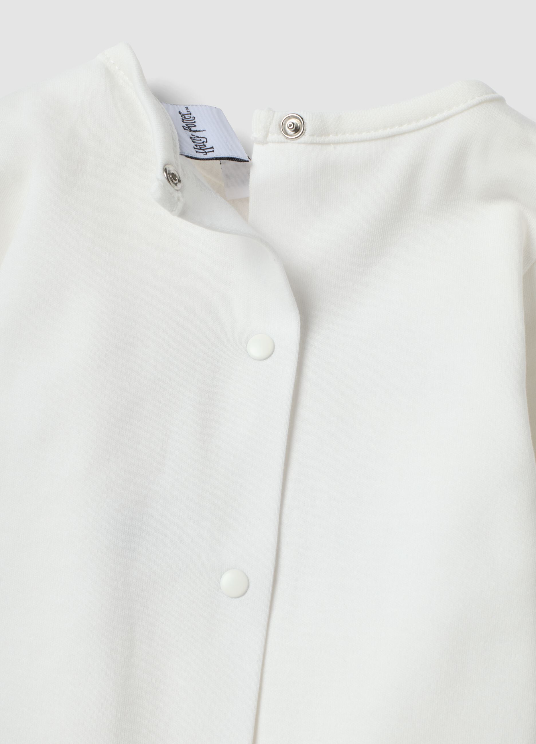Wei&szlig;es Baby-Shirt aus reiner Bio-Baumwolle mit Harry-Potter-Stickerei