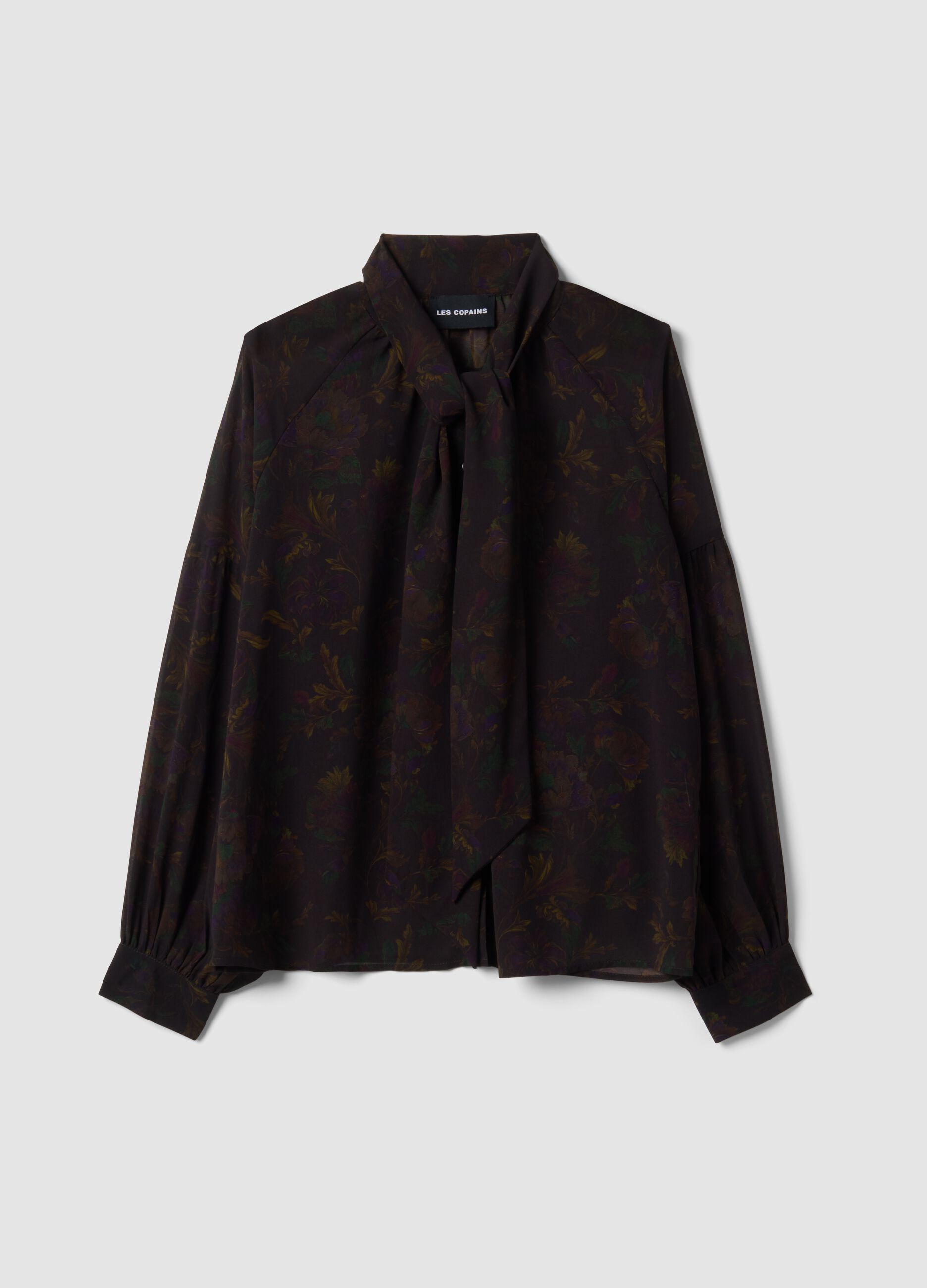 Camicia nera con fantasia floreale e fiocco al collo