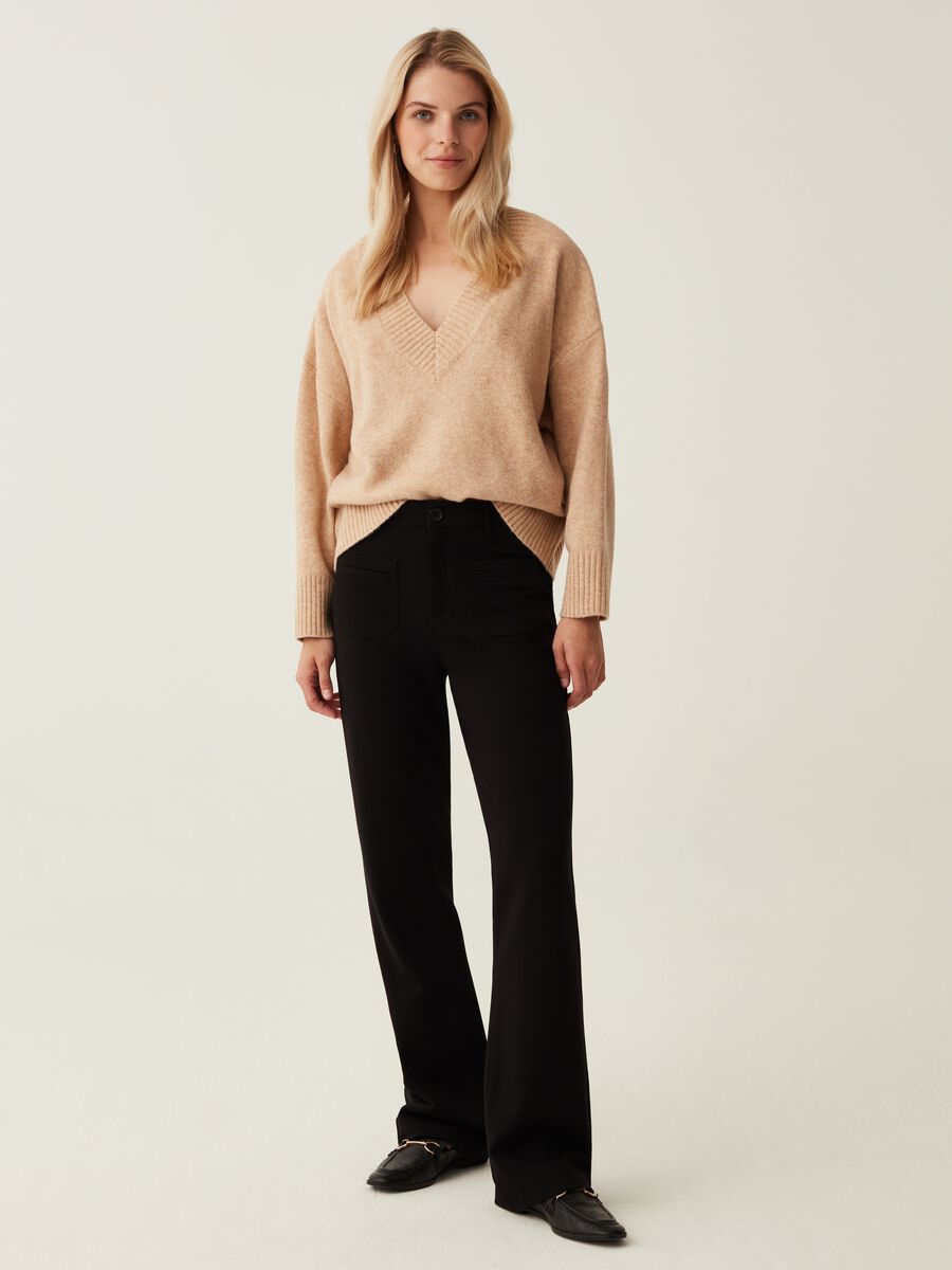 Flare-fit trousers with pockets_1