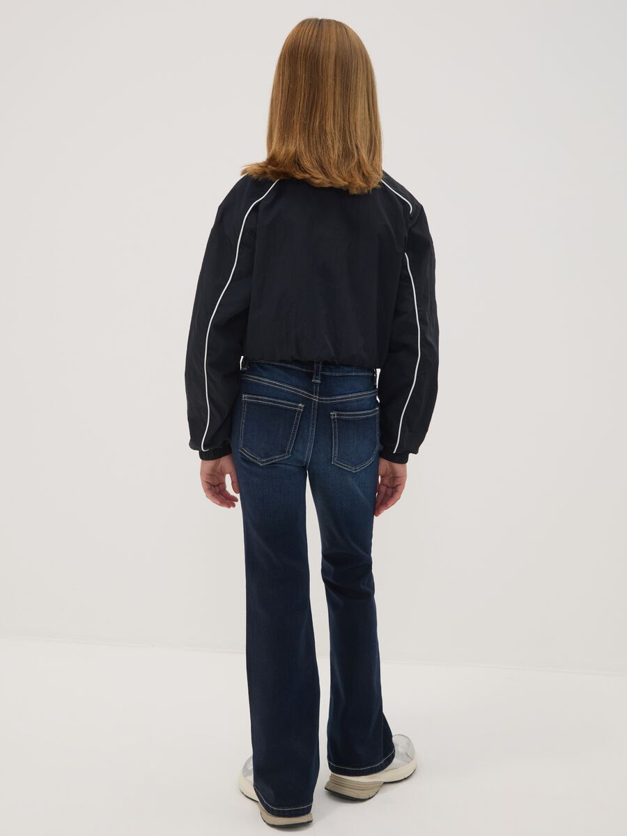 Girls&rsquo; blue flared stretch-cotton jeans_1