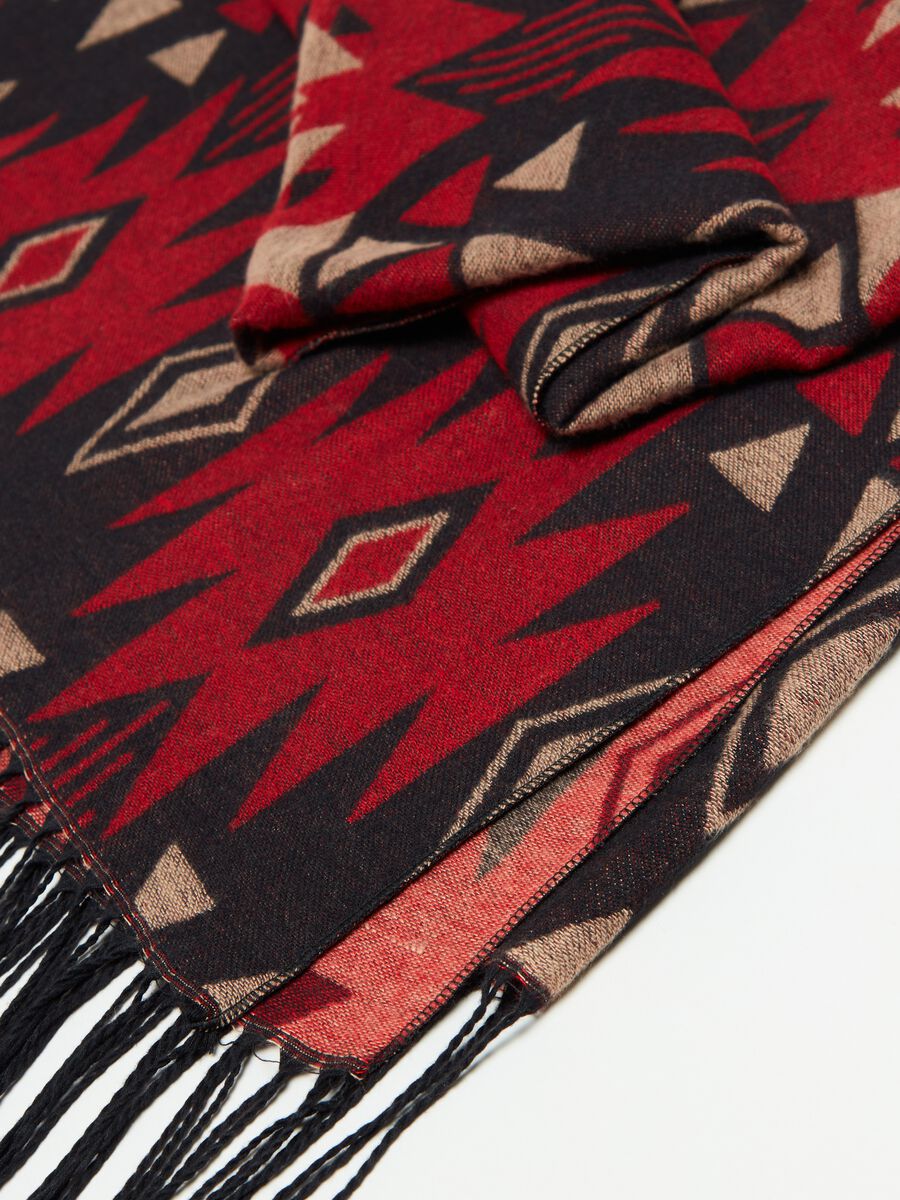 Cape with Ikat pattern and fringe_1