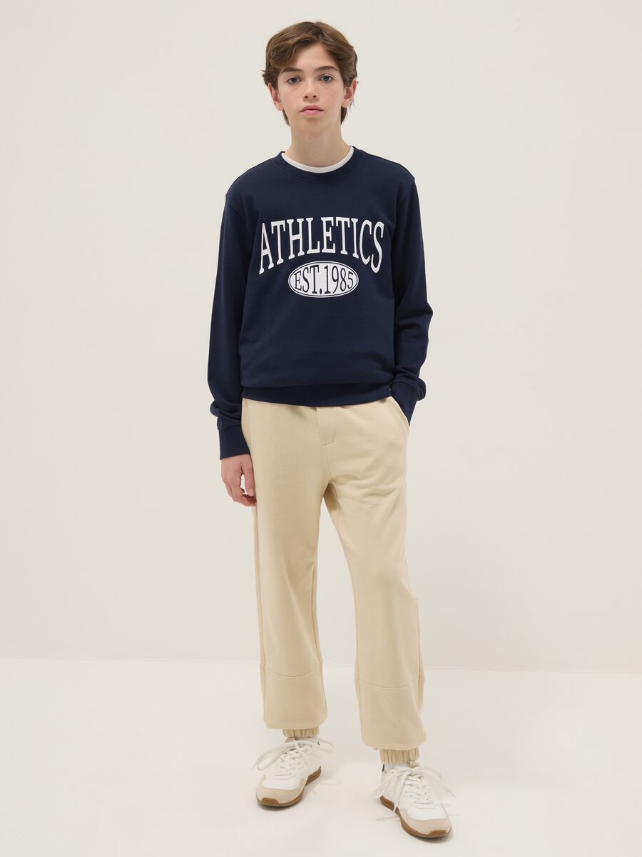 Beige jogger trousers for boys in pure organic cotton regular fit_0