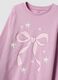 Rosa Pyjama aus Bio-Baumwolljersey mit Schleifenprint_2