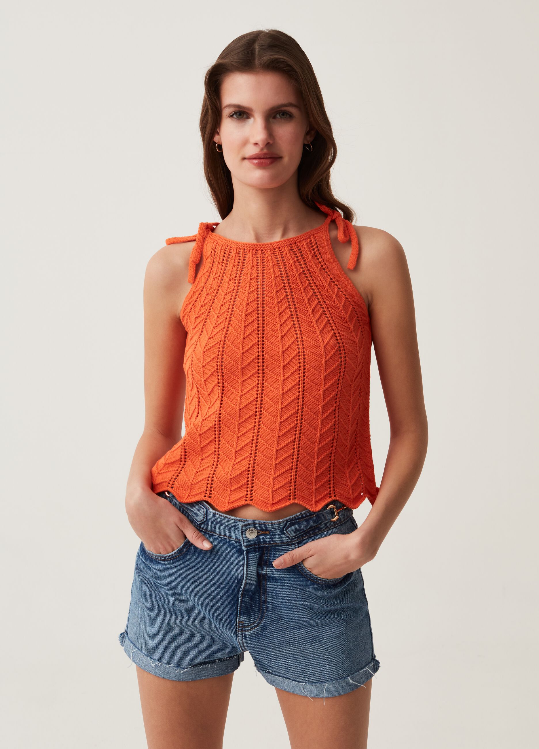 Crochet cotton tank top with halter neck.