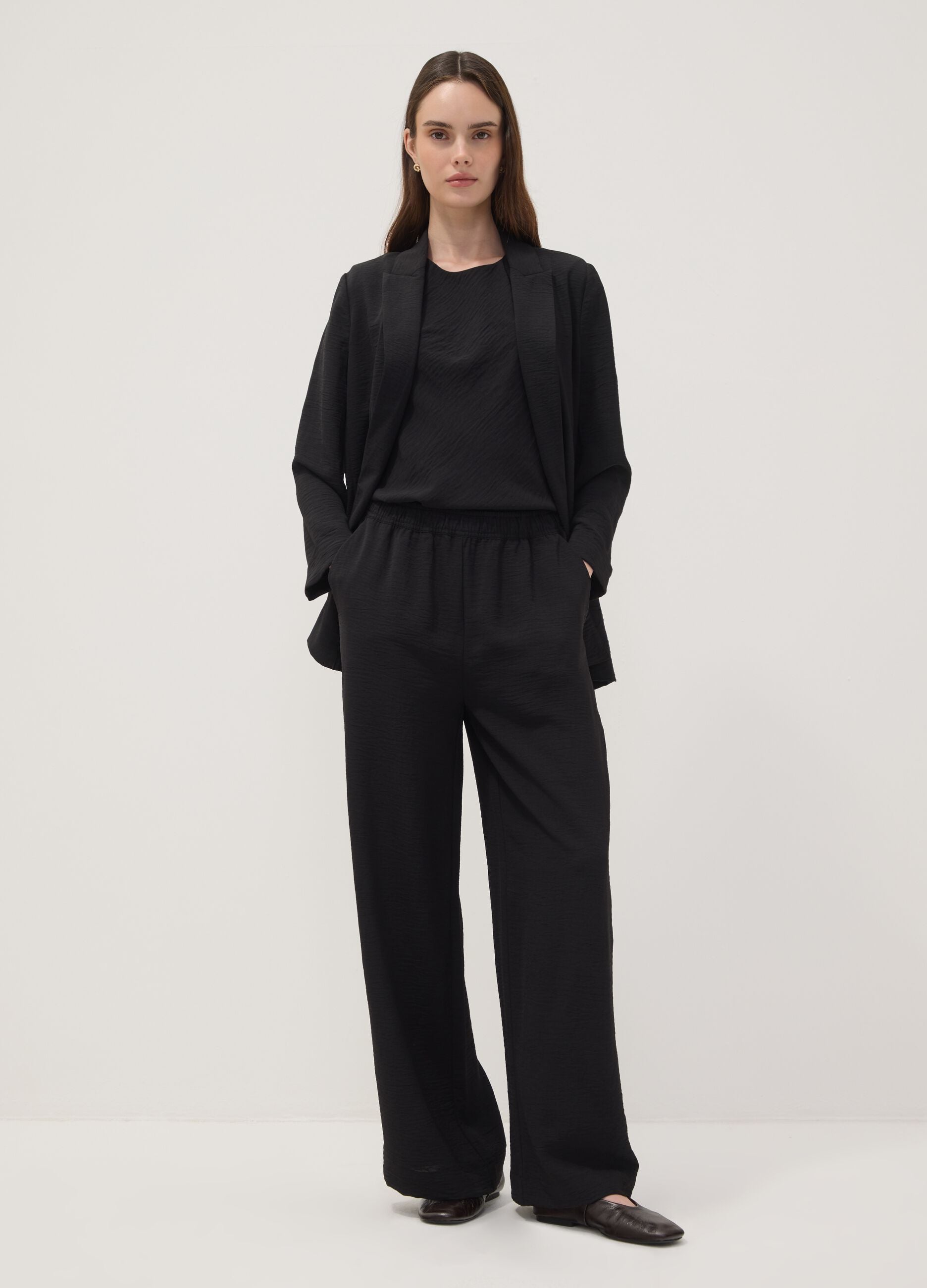 Black wide-leg trousers with elasticated waist