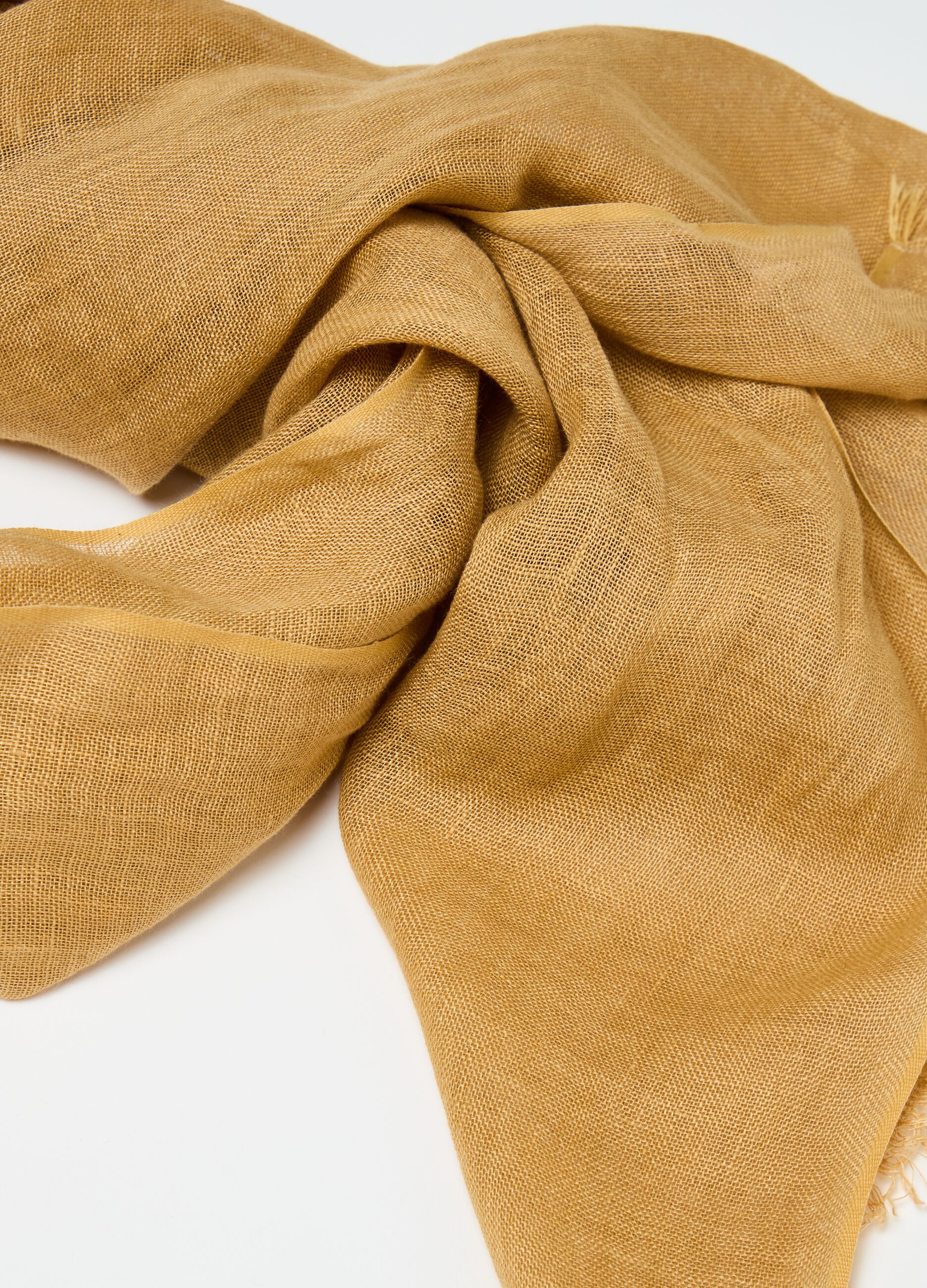 Contemporary fringed scarf in linen