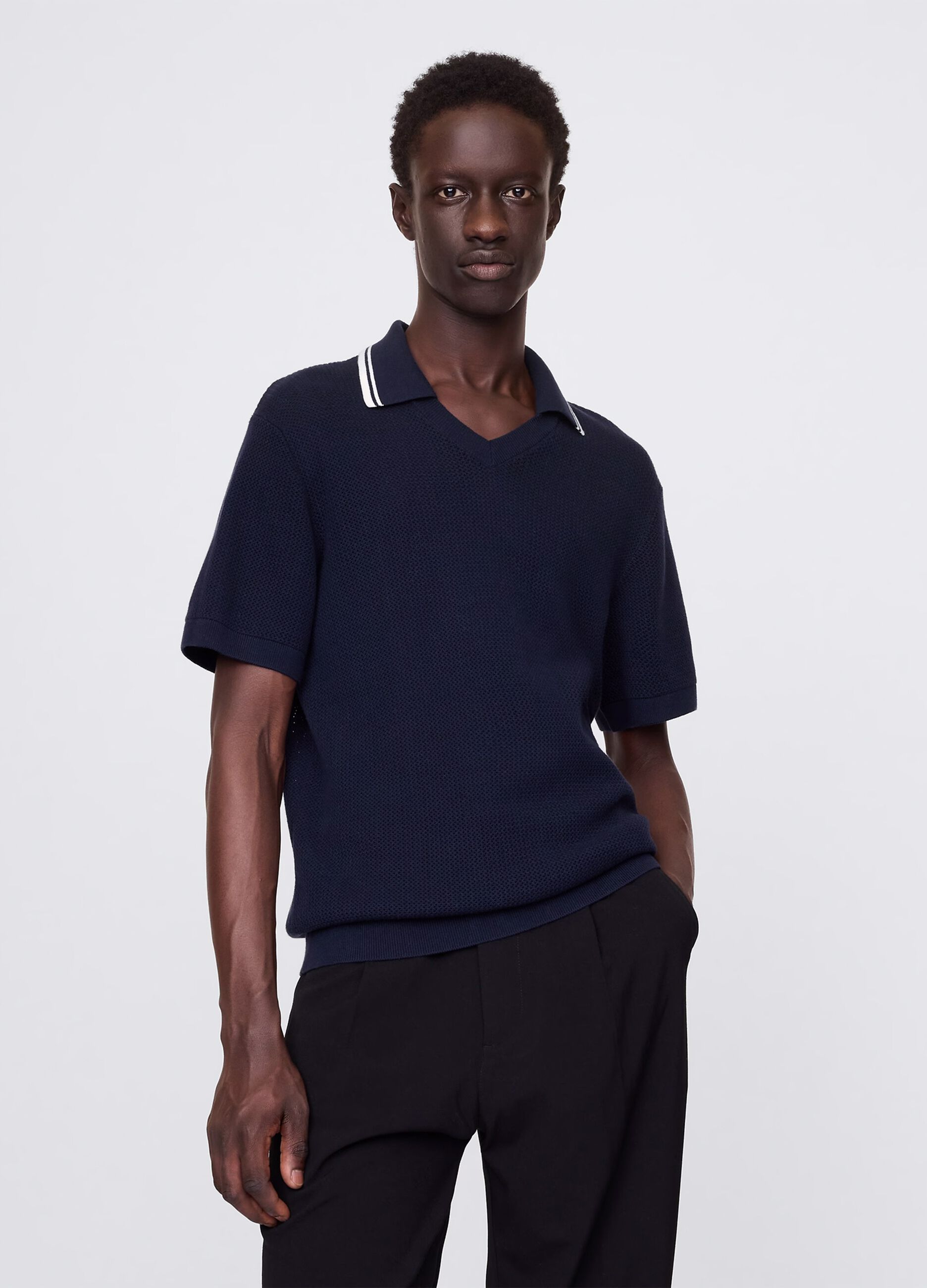 Openwork polo shirt in blue cotton