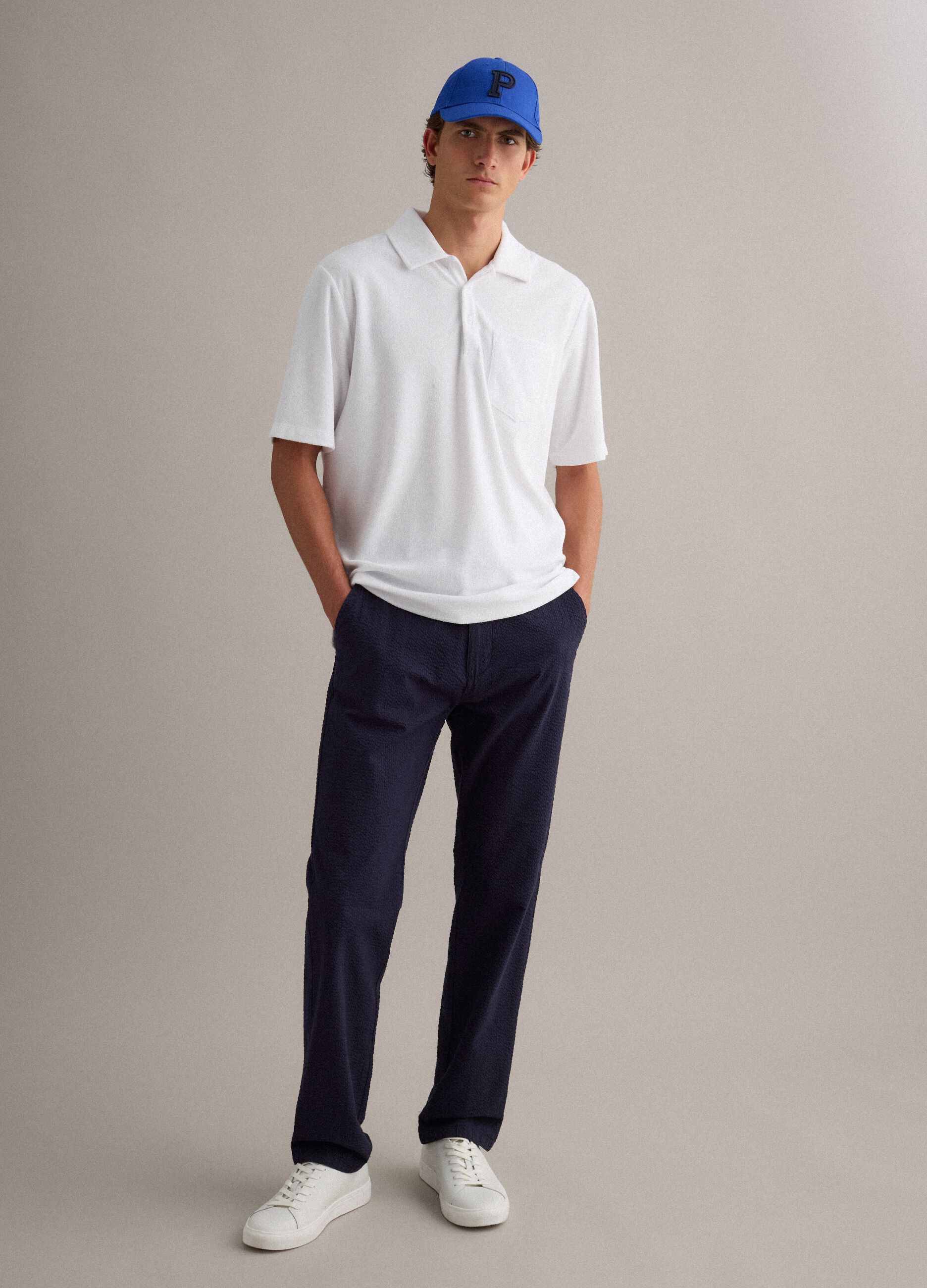 White cotton-blend polo shirt