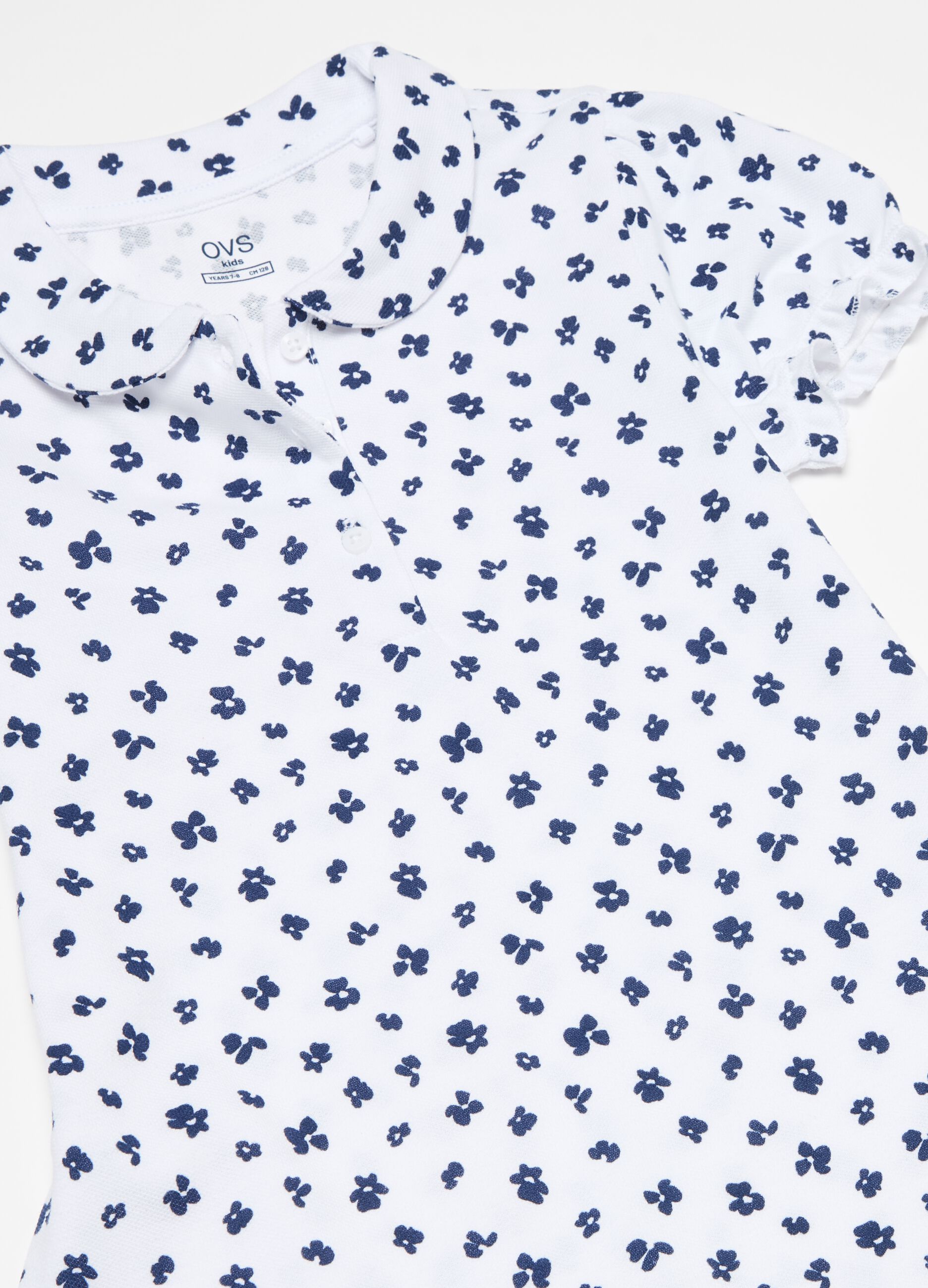 Polo shirt with all-over small flowers print