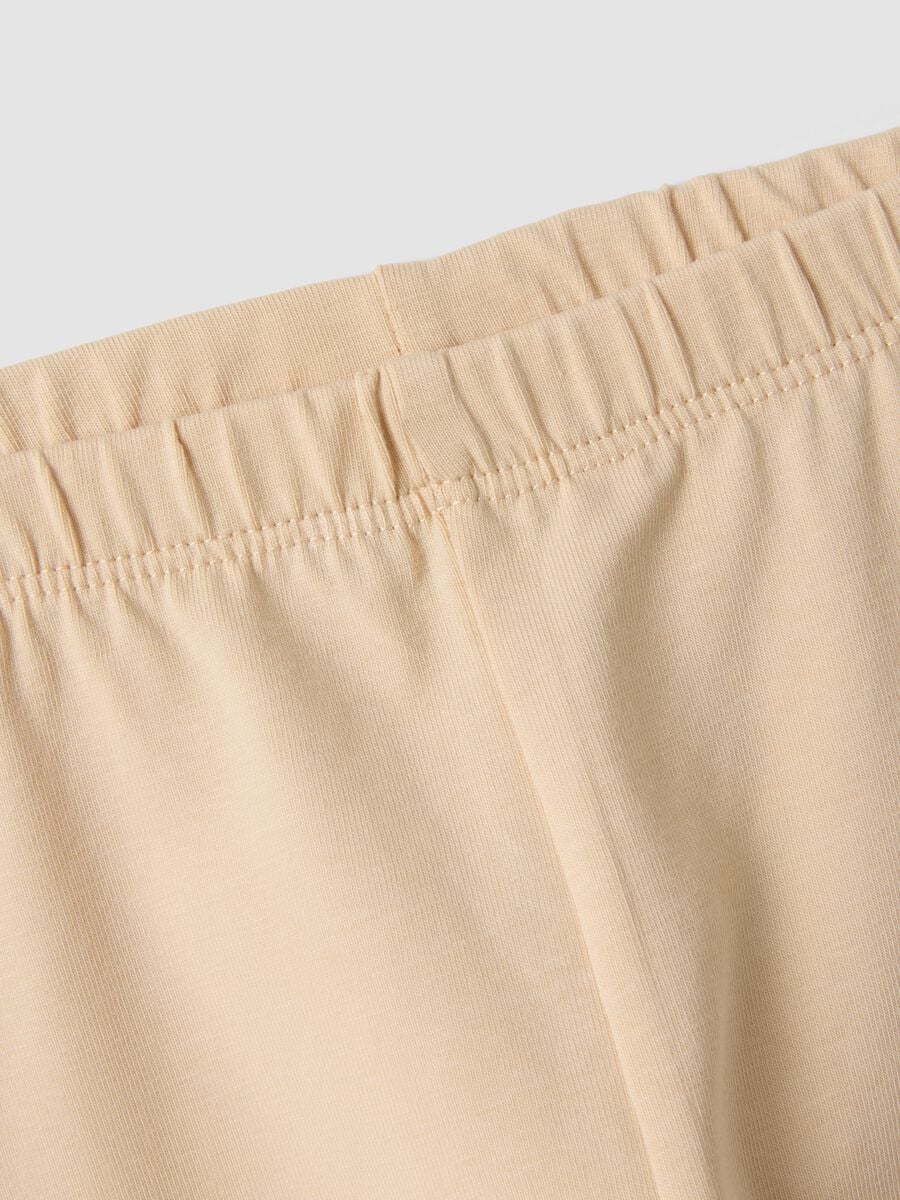 Beige stretch organic cotton leggings with bows for baby girl_3
