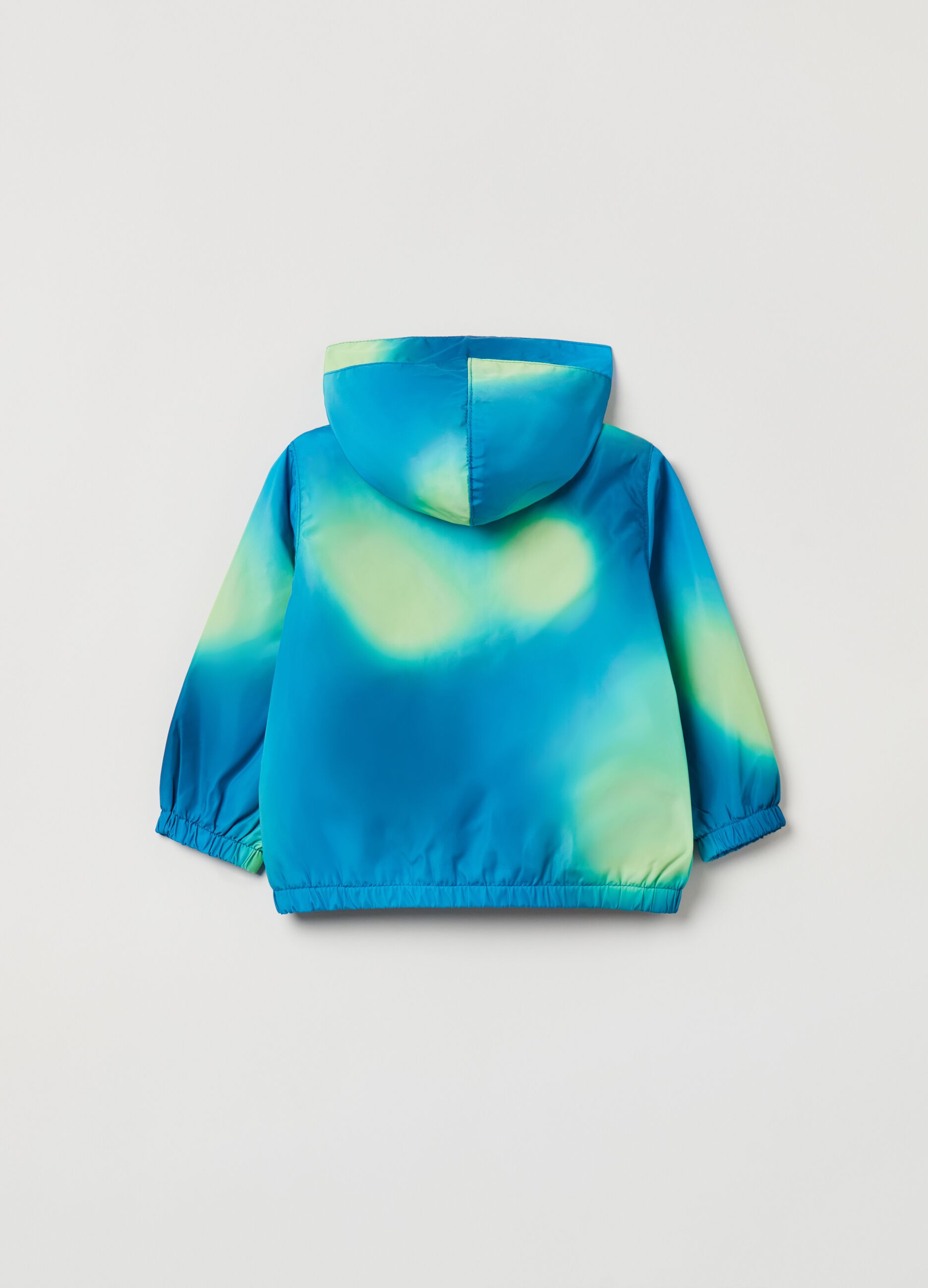 Waterproof jacket in tie dye pattern.
