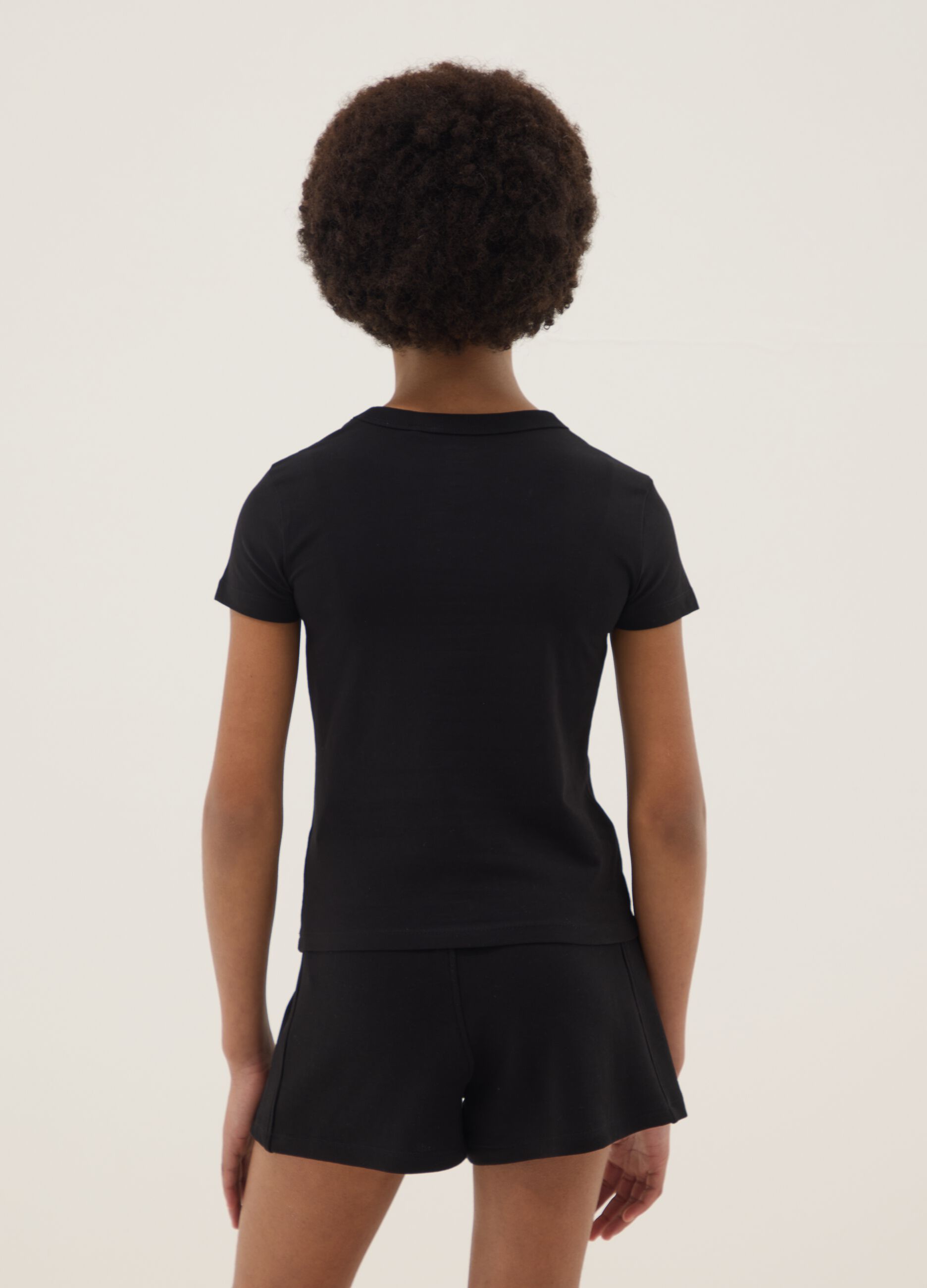 T-shirt preta de algod&atilde;o el&aacute;stico para rapariga, corte regular