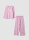 Rosa Pyjama aus Bio-Baumwolljersey mit Schleifenprint_0
