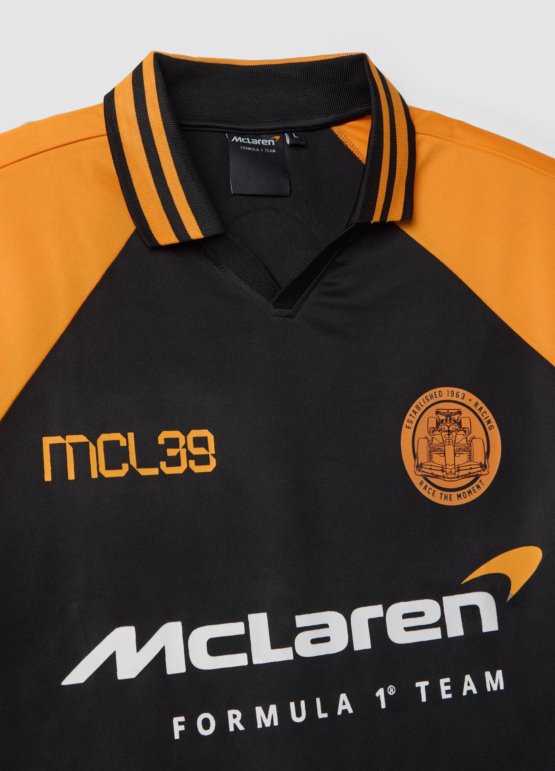 Black and orange oversized McLaren logo polo shirt