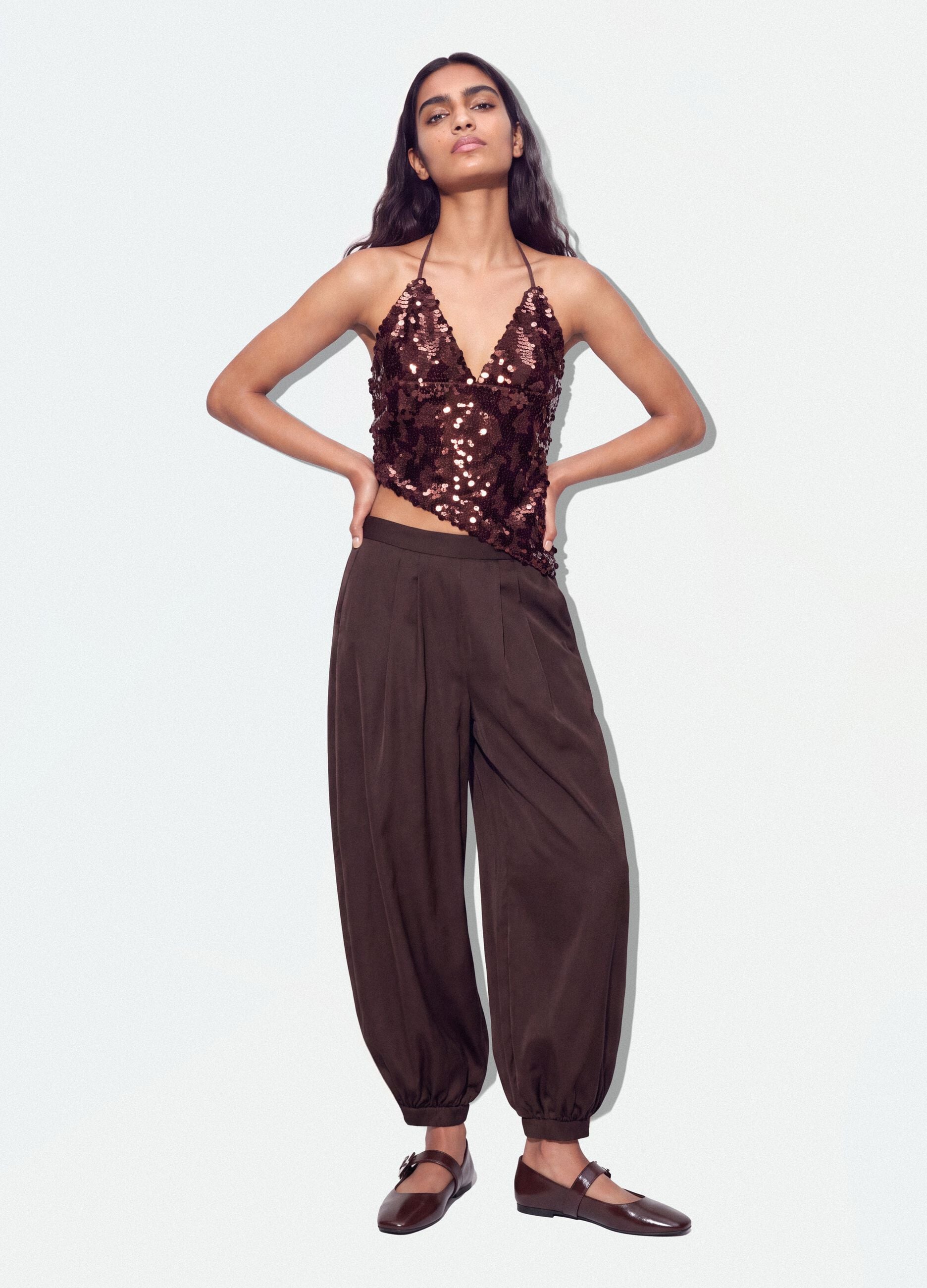 Brown baggy-fit trousers with elasticated cuffs