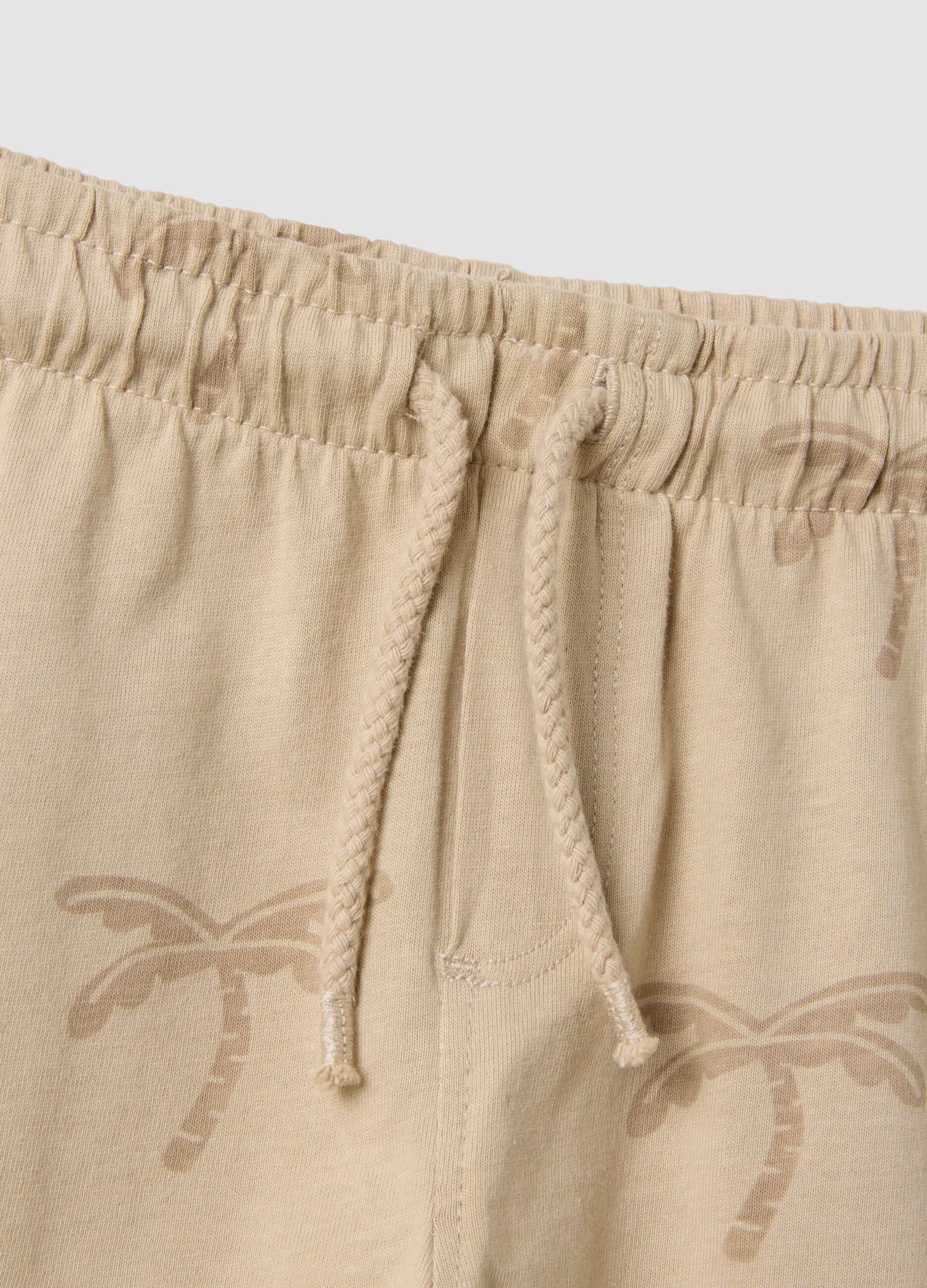 Beige organic cotton shorts with all-over print