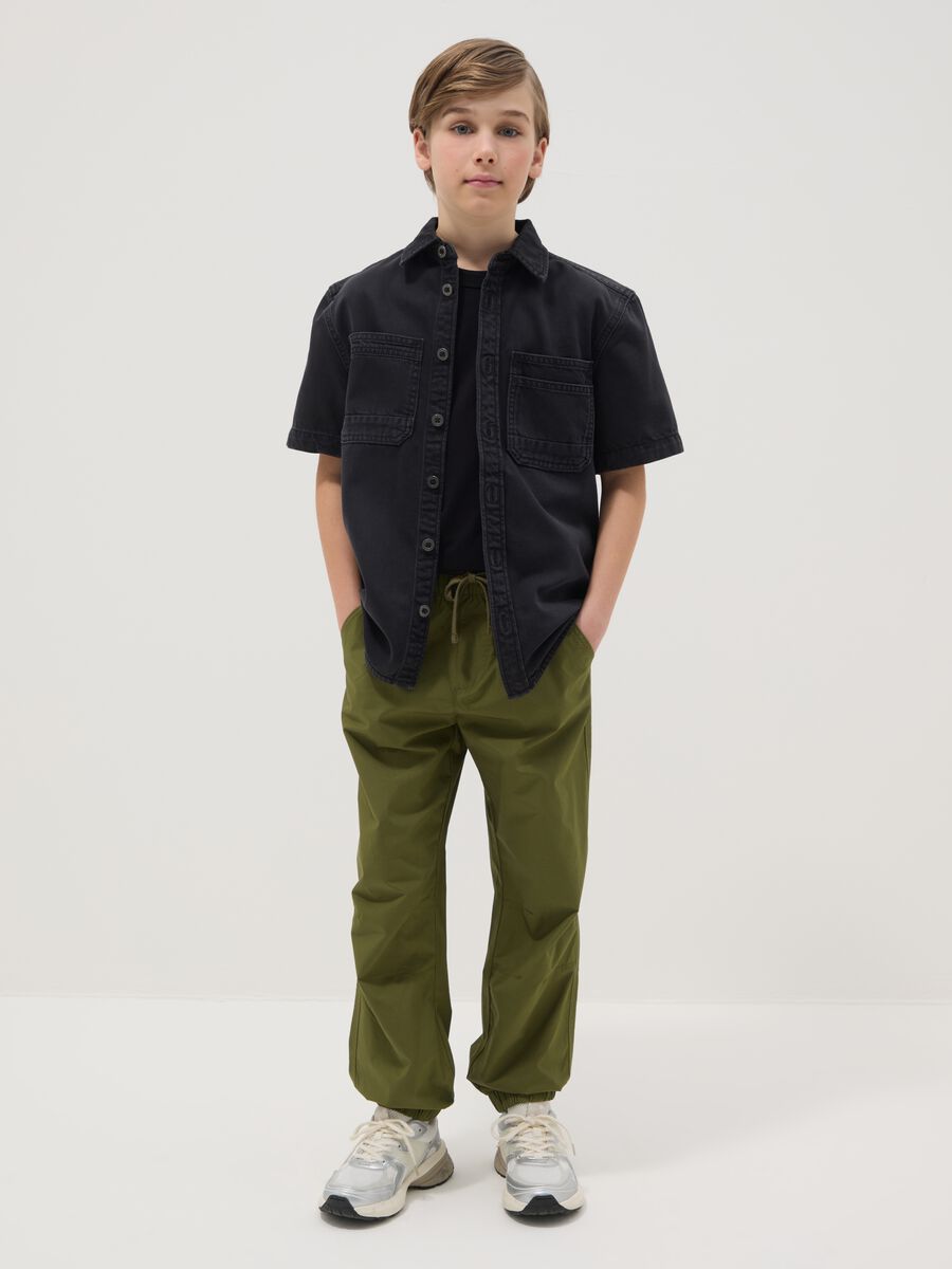 Boy's green wide leg trousers in pure cotton_0