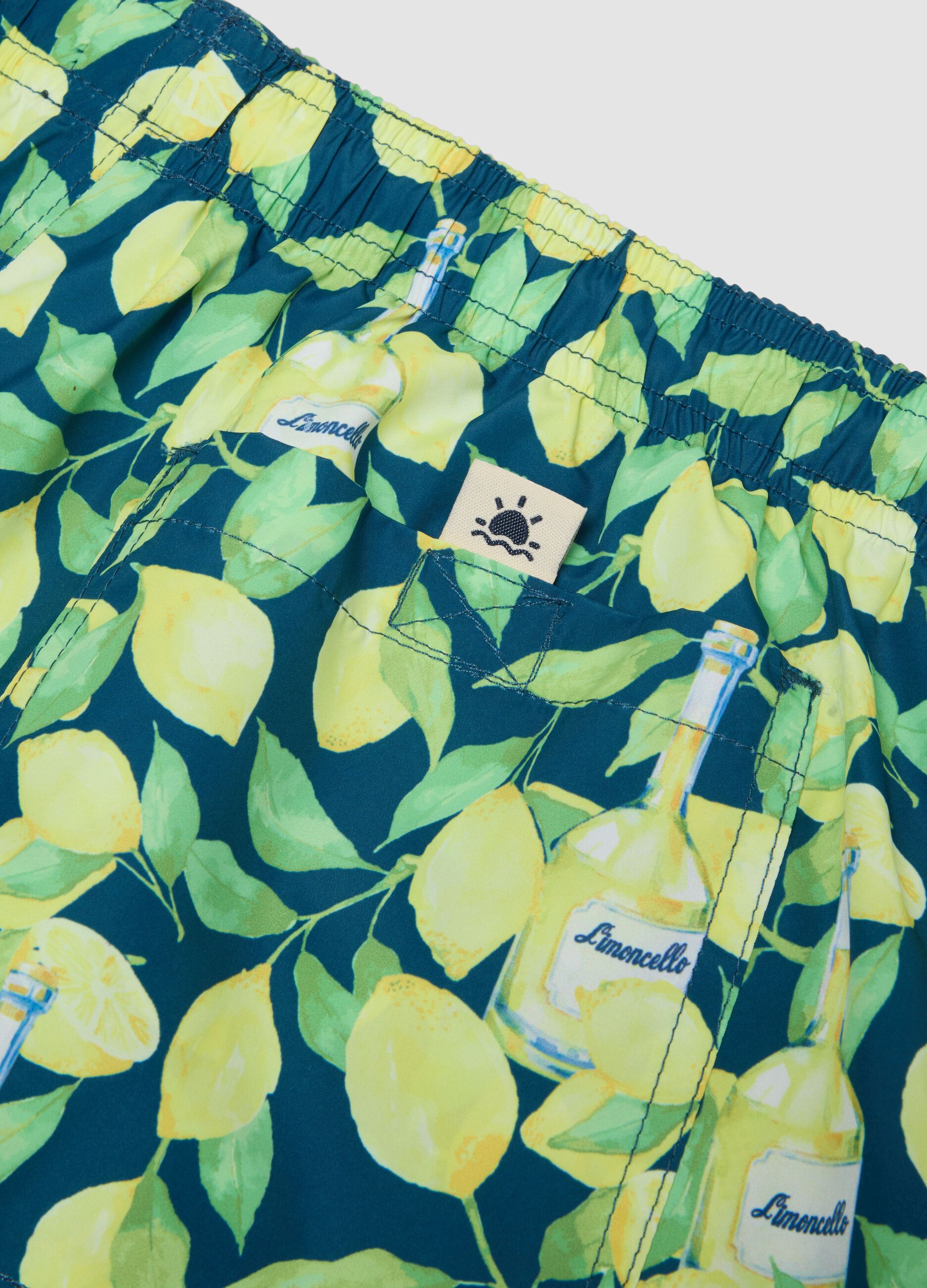 Blaue Boxer-Badeshorts mit Limoncello-Print