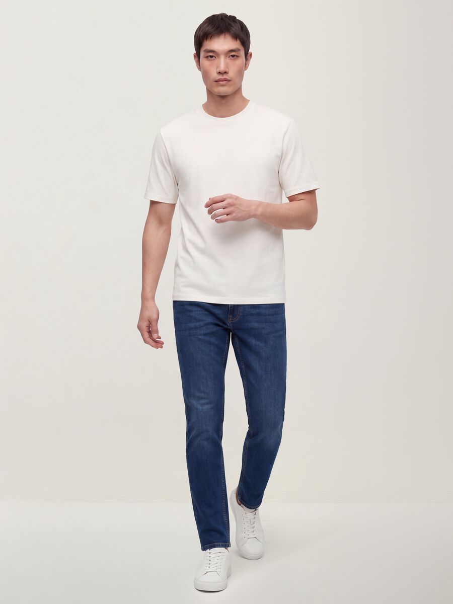 Jeans azuis slim fit em algod&atilde;o el&aacute;stico_0