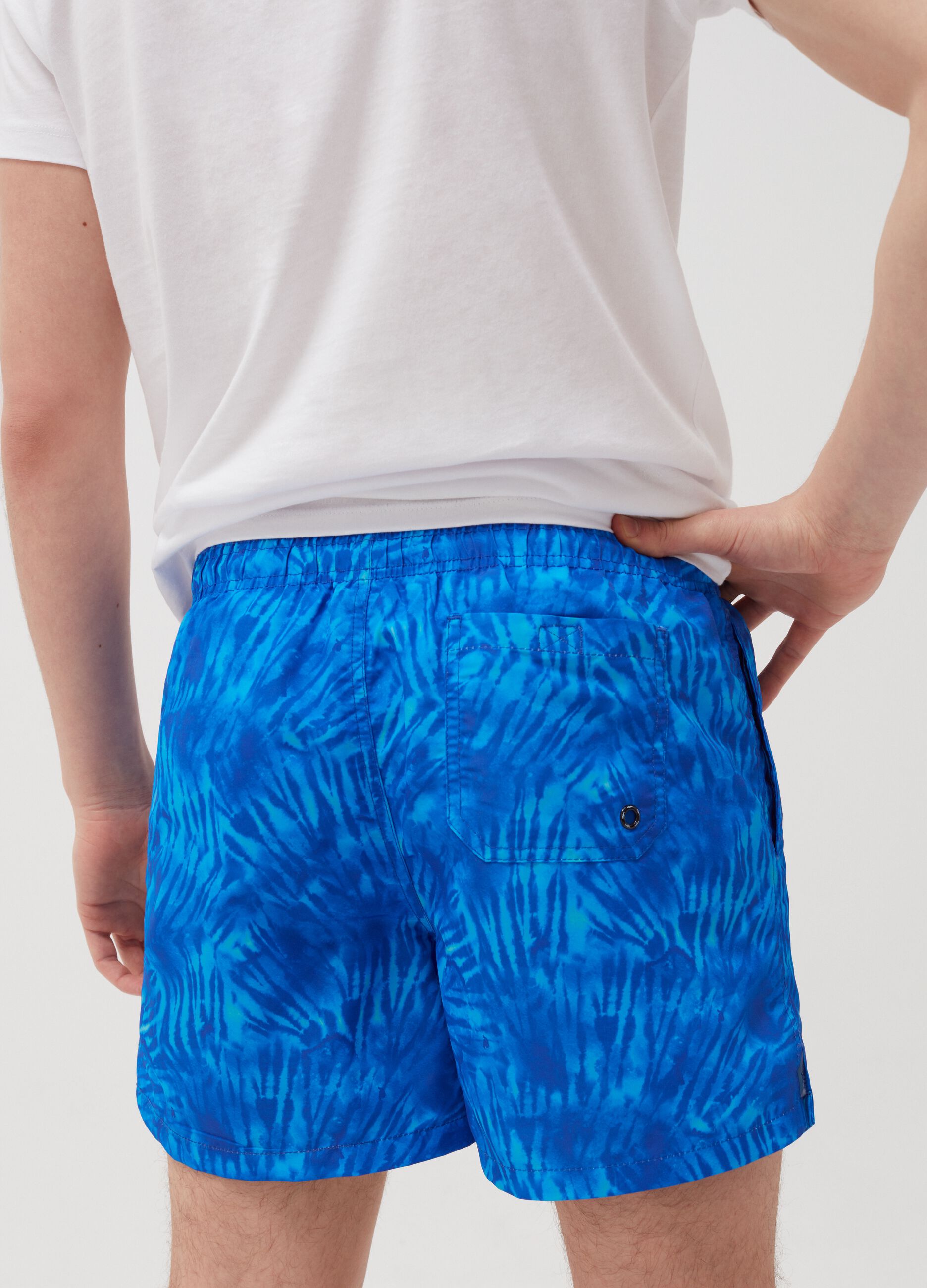 Swimming trunks with Maui and Sons pattern