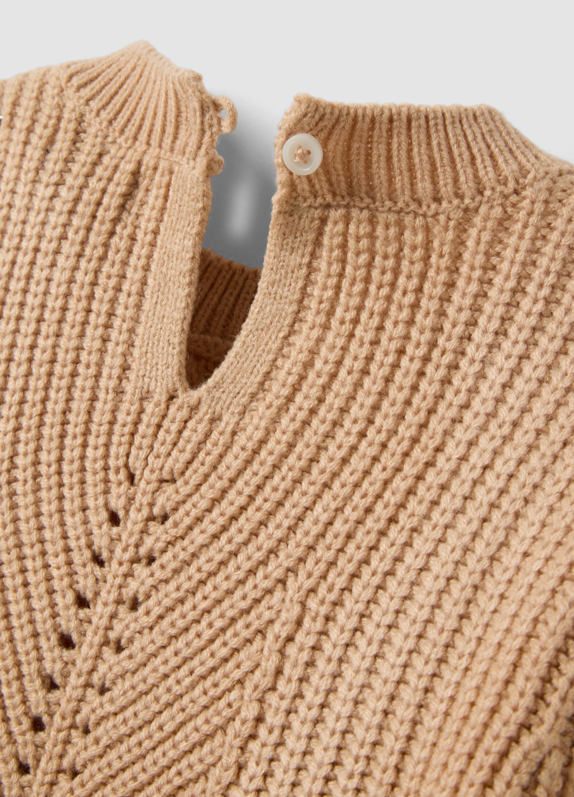 Beige knit jumper with openwork crew neck