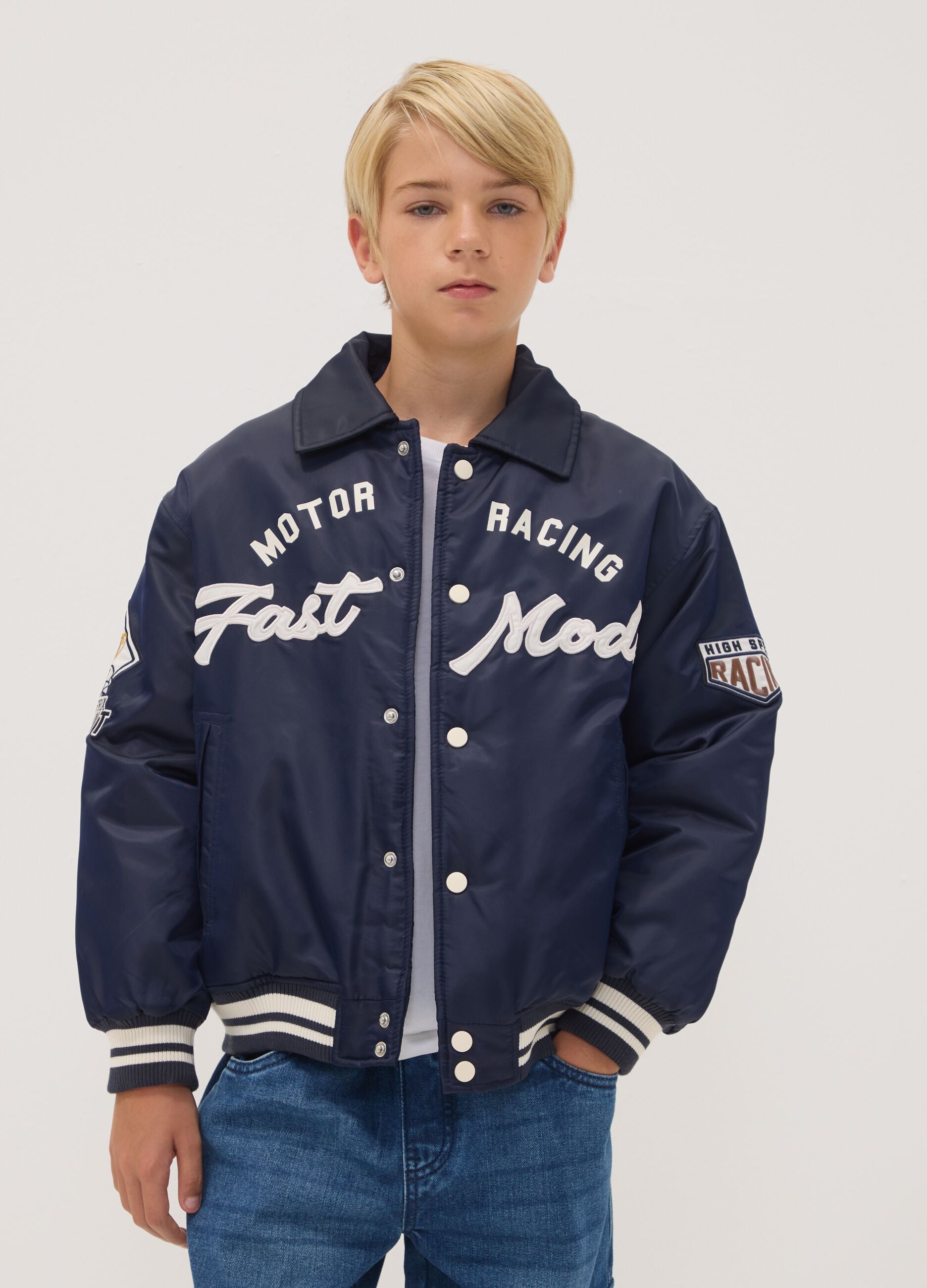 Blue varsity jacket with zip and racing print