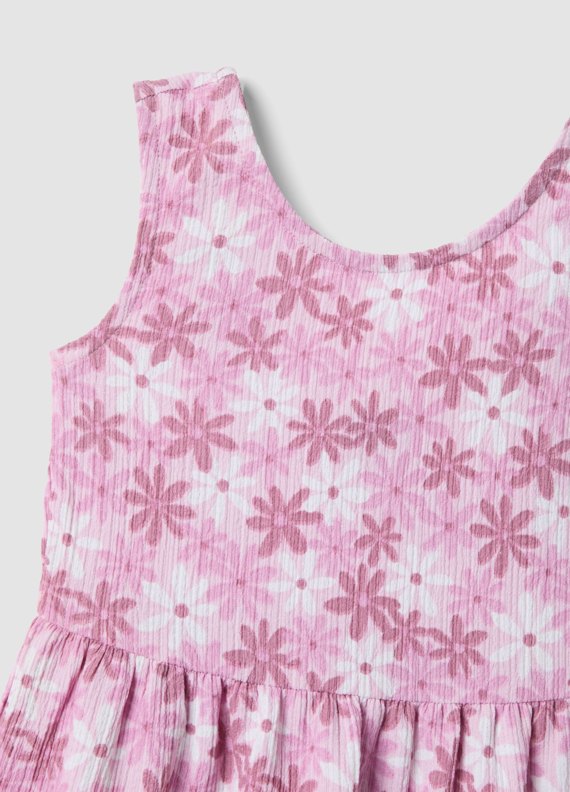 Vestido rosa sem mangas em tecido el&aacute;stico com estampado floral