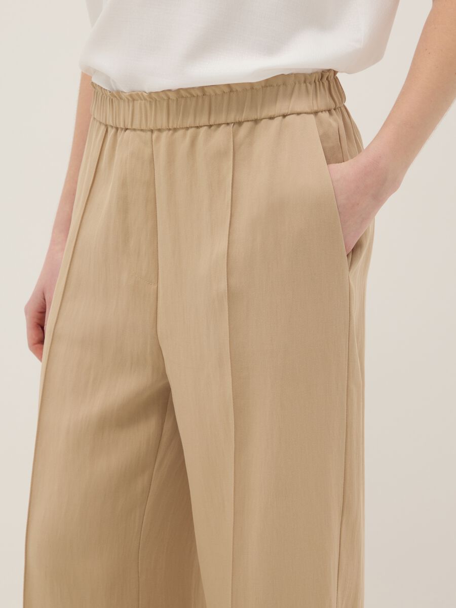 Beige wide leg jogger trousers in Lyocell and viscose blend_4
