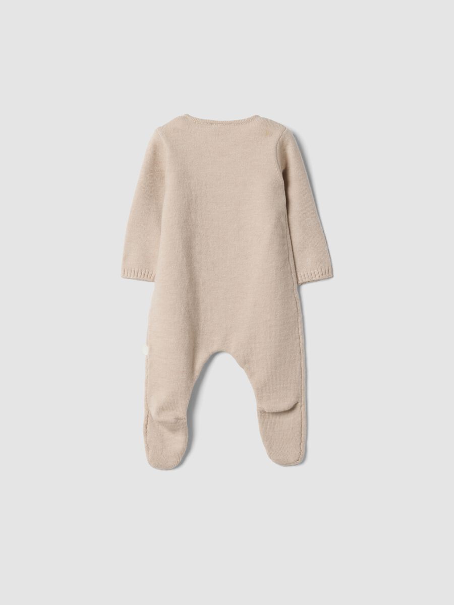 Beige baby sleepsuit with feet and wrap closure_1