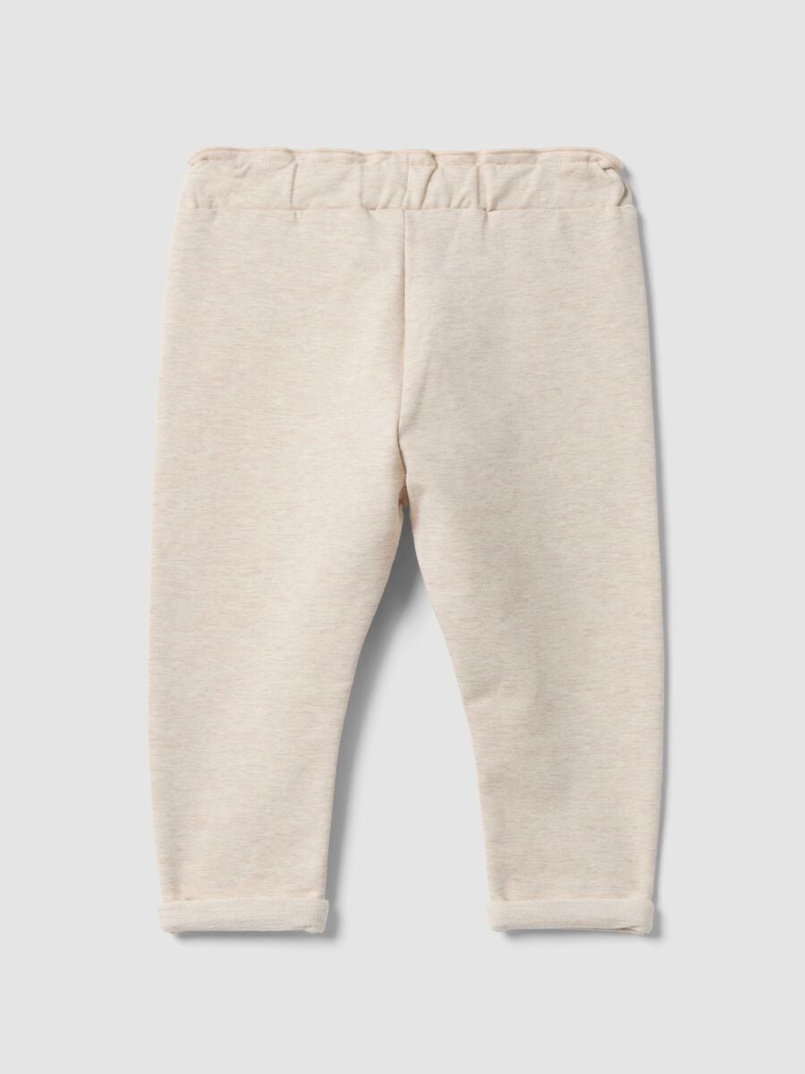 Beige stretch cotton joggers with turn-up cuff for baby girl_1