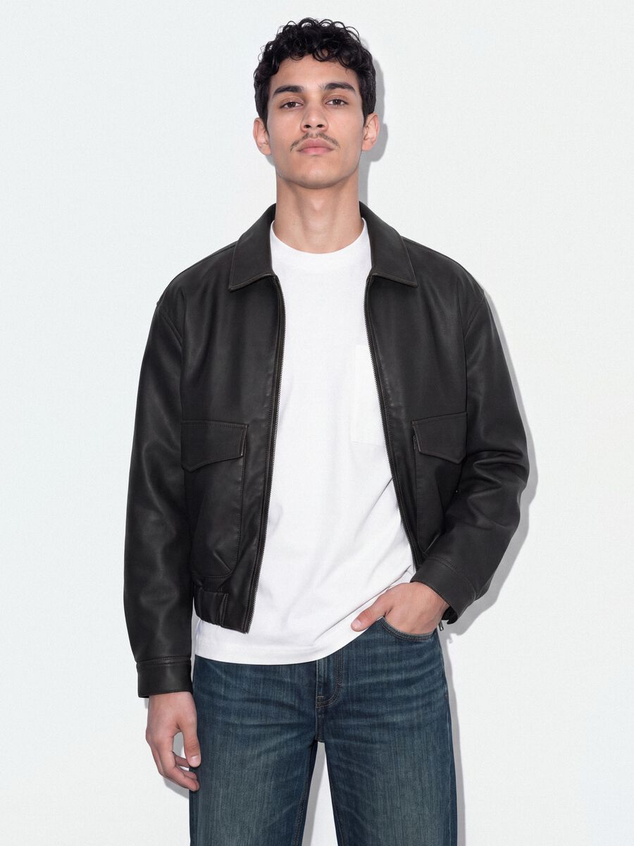 Black cropped jacket with zip and flap pockets, oversized fit_0
