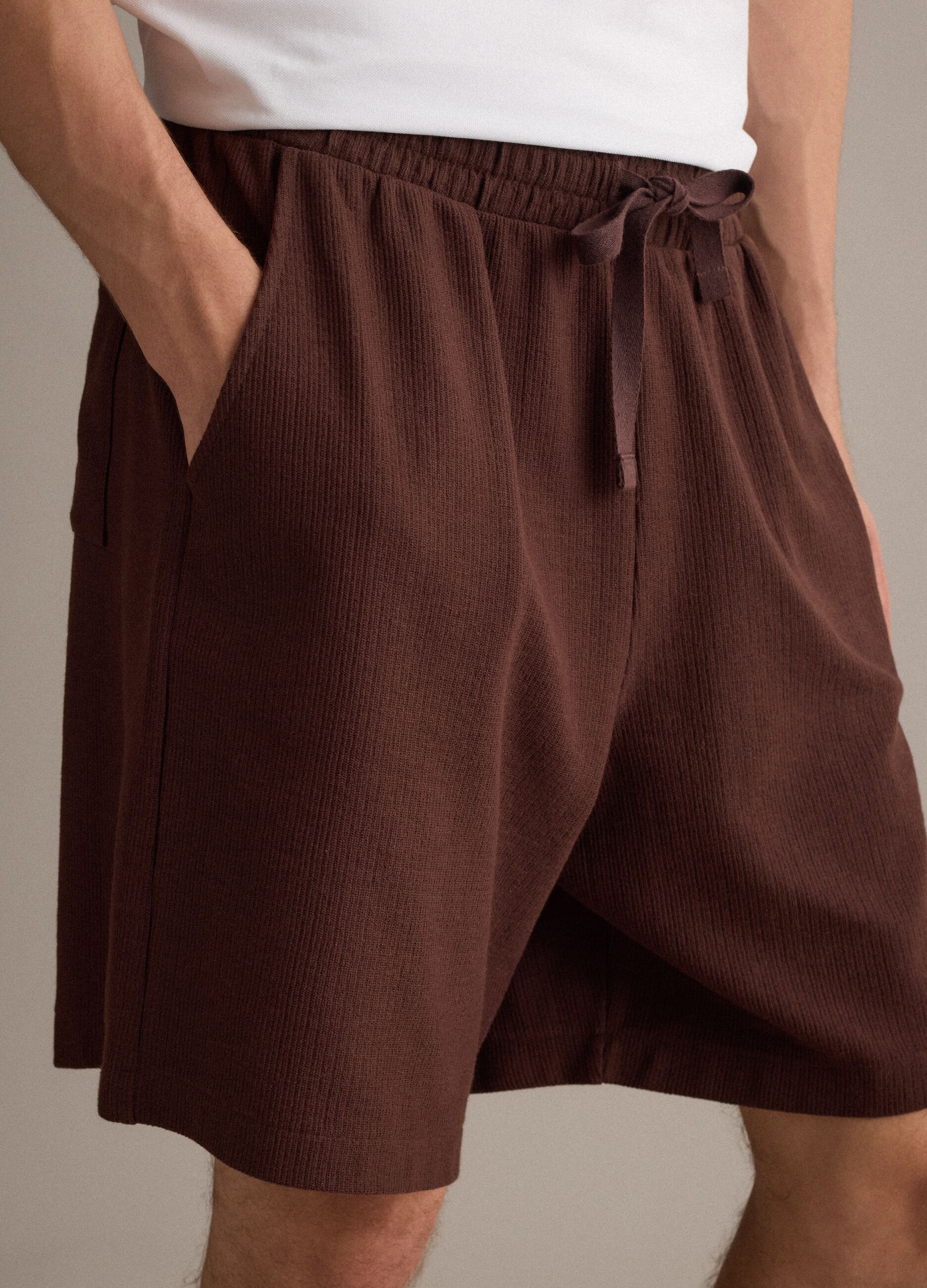 Brown cotton-blend jogger shorts with drawstring, relaxed fit