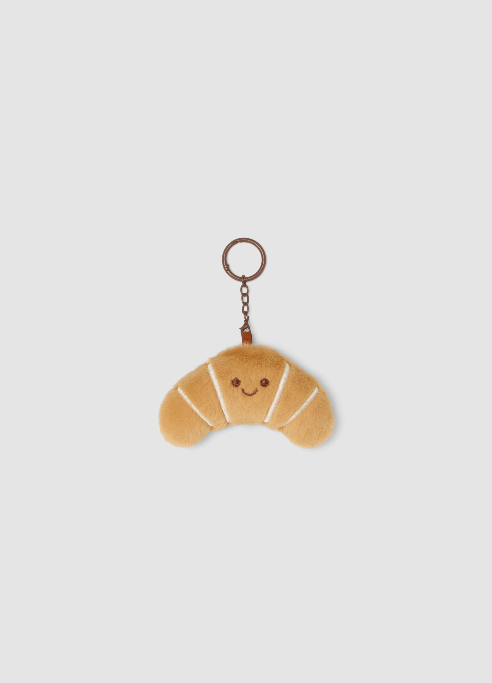 Brown croissant-shaped keyring