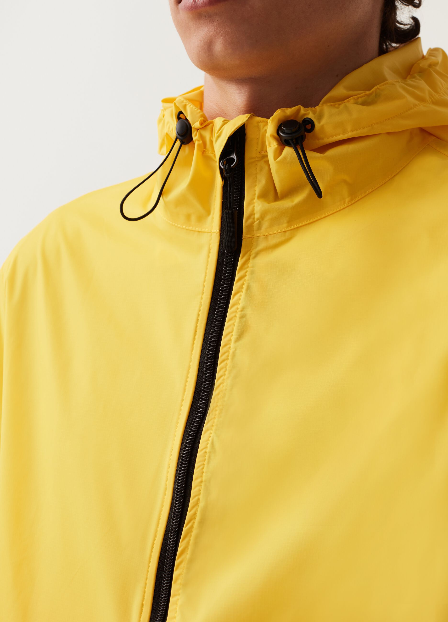 Short waterproof jacket with hood