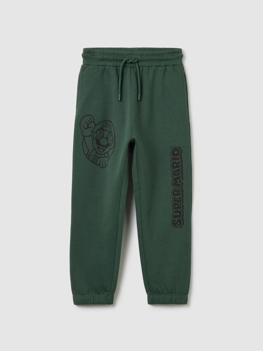 Children's green jogger trousers in pure cotton_0
