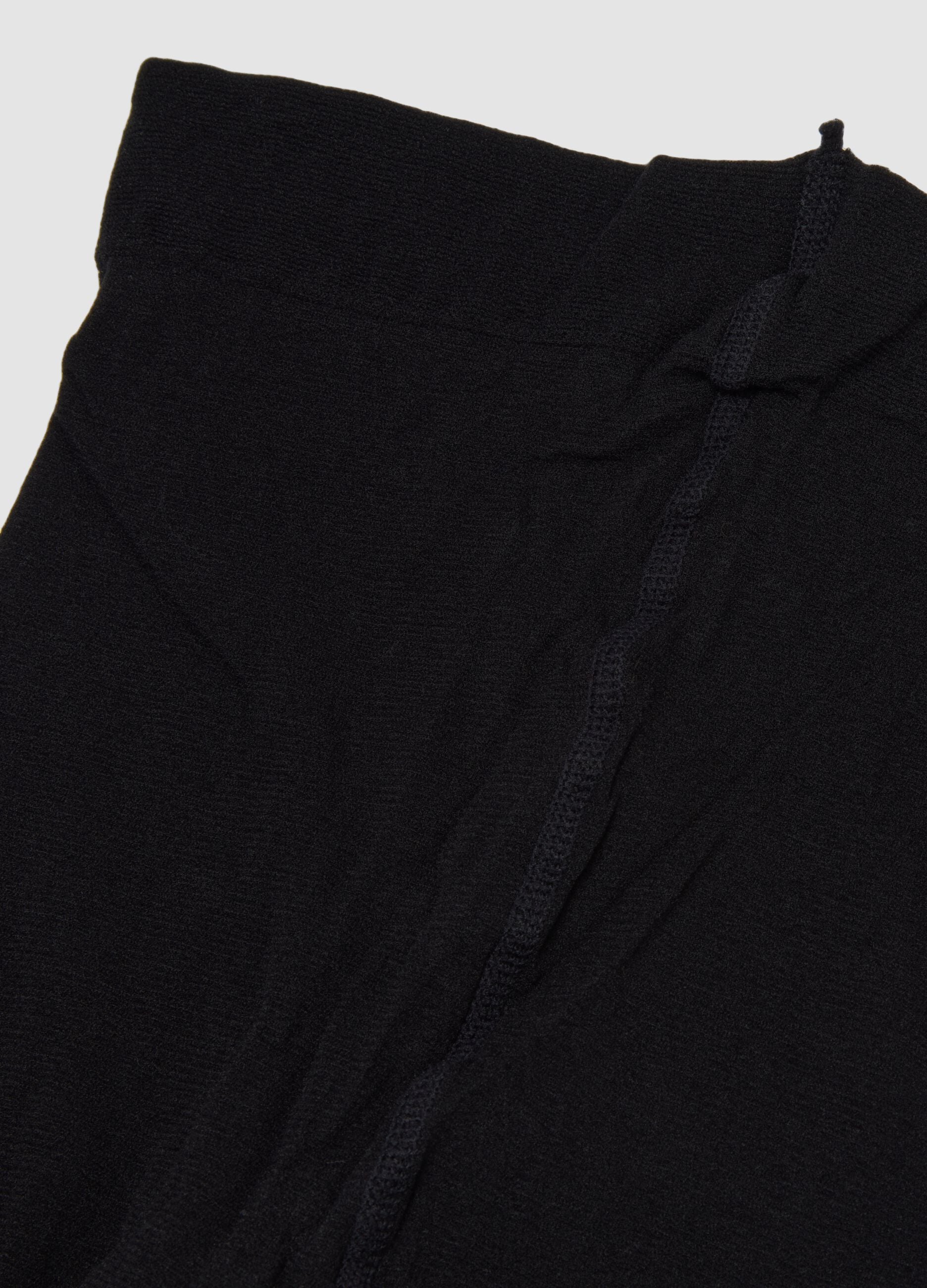 Schwarze transparente Stretch-Strumpfhose