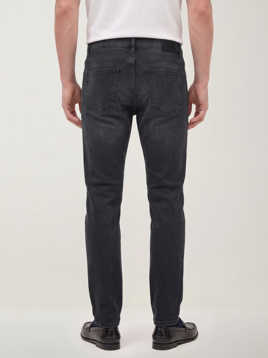 Black slim-fit stretch cotton denim jeans_1