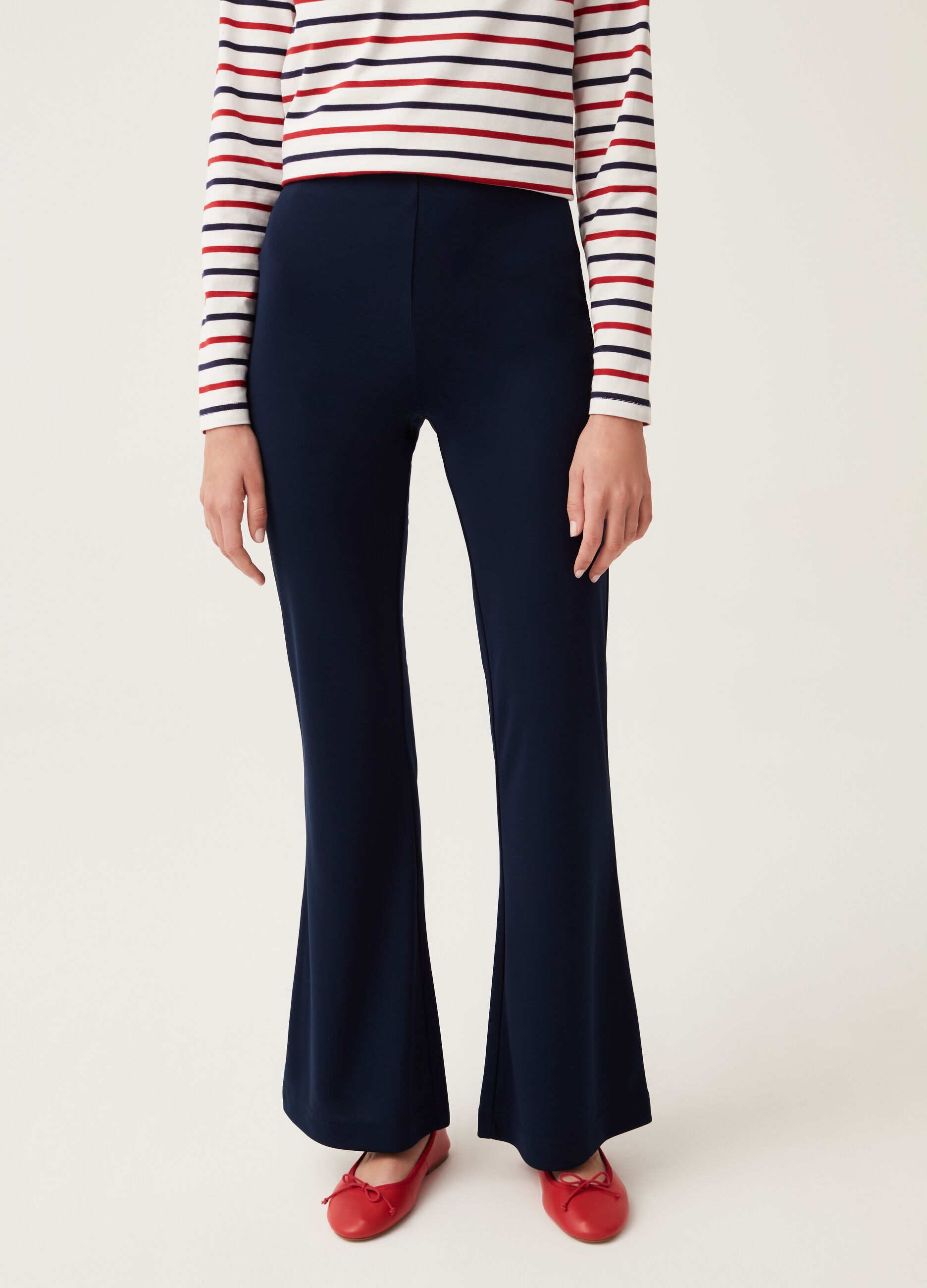 Solid colour flare-fit trousers