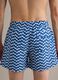 Blue swim shorts with wave pattern_3