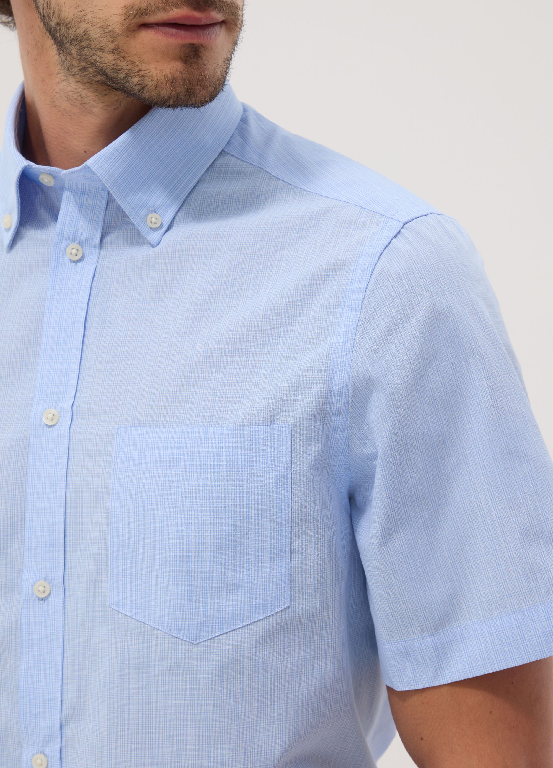 Light blue short-sleeve shirt with button-down collar