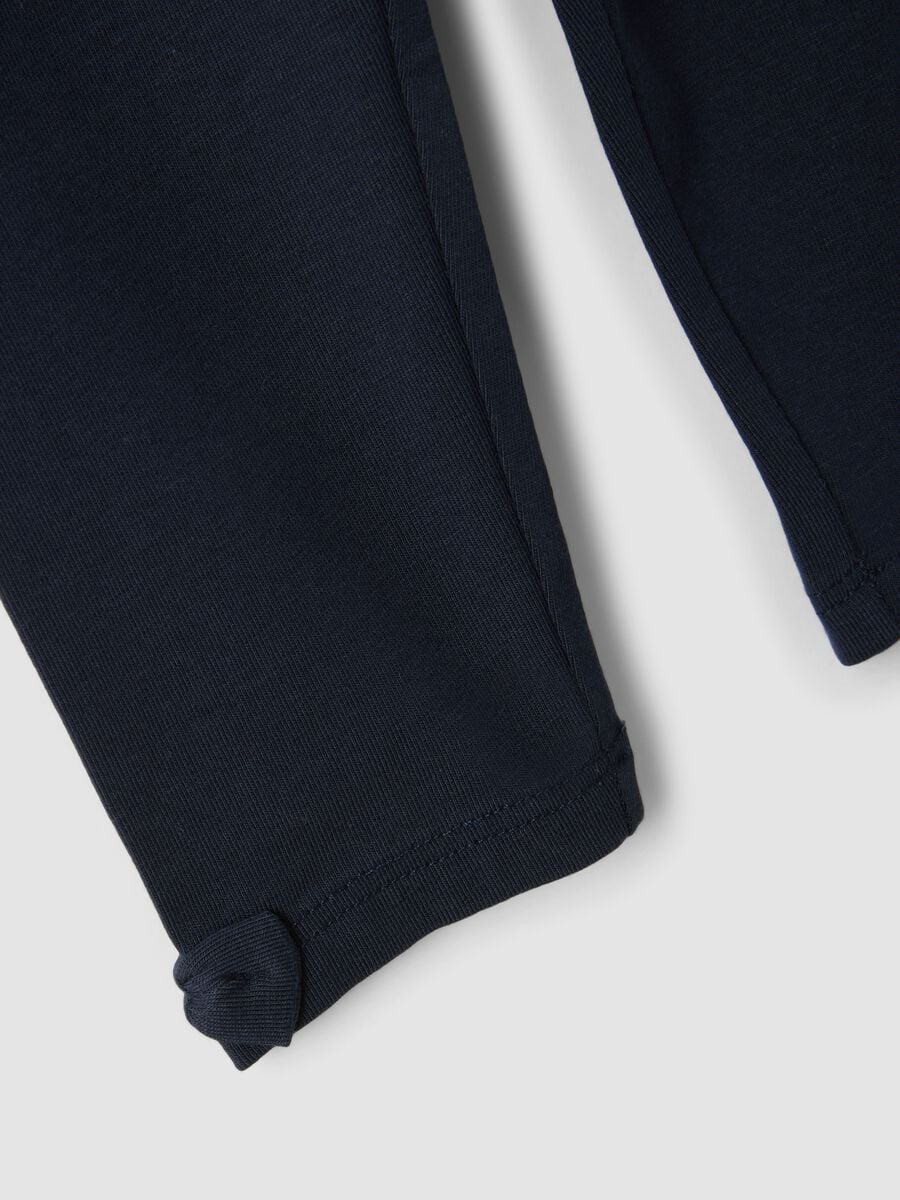 Blue stretch organic cotton leggings with bows for baby girl_2