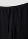 Schwarze Jogger in Regular Fit aus elastischem Easy-Dry-Gewebe_5