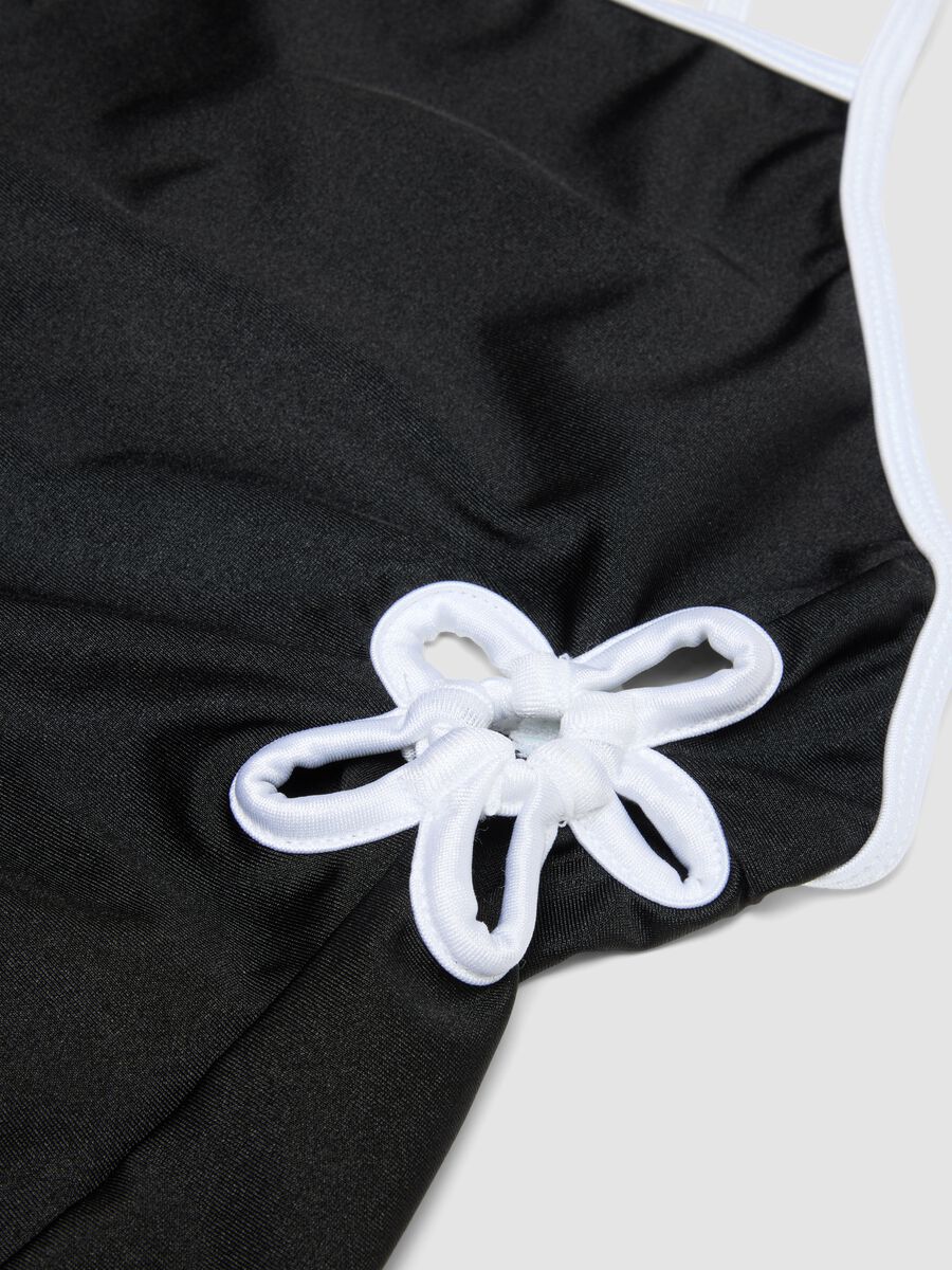 Black stretch one-piece swimsuit with contrasting trim_3