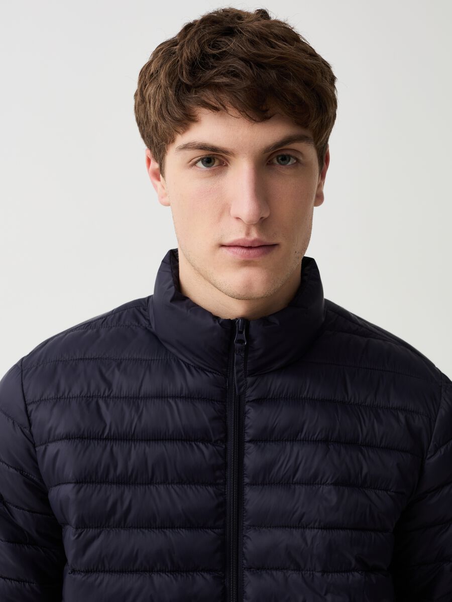 Ultralight quilted down jacket with high neck_1