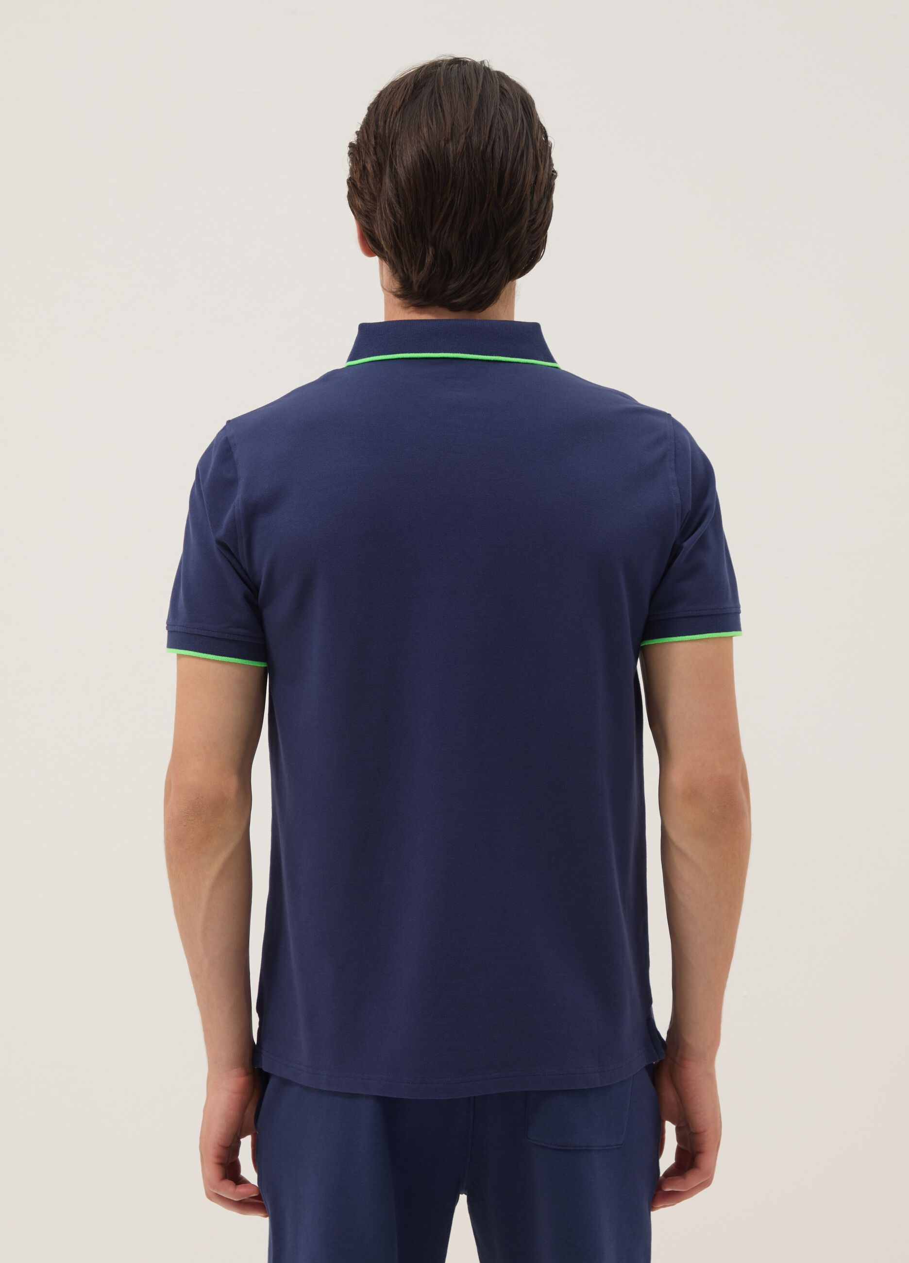 Blue short-sleeved polo in stretch cotton