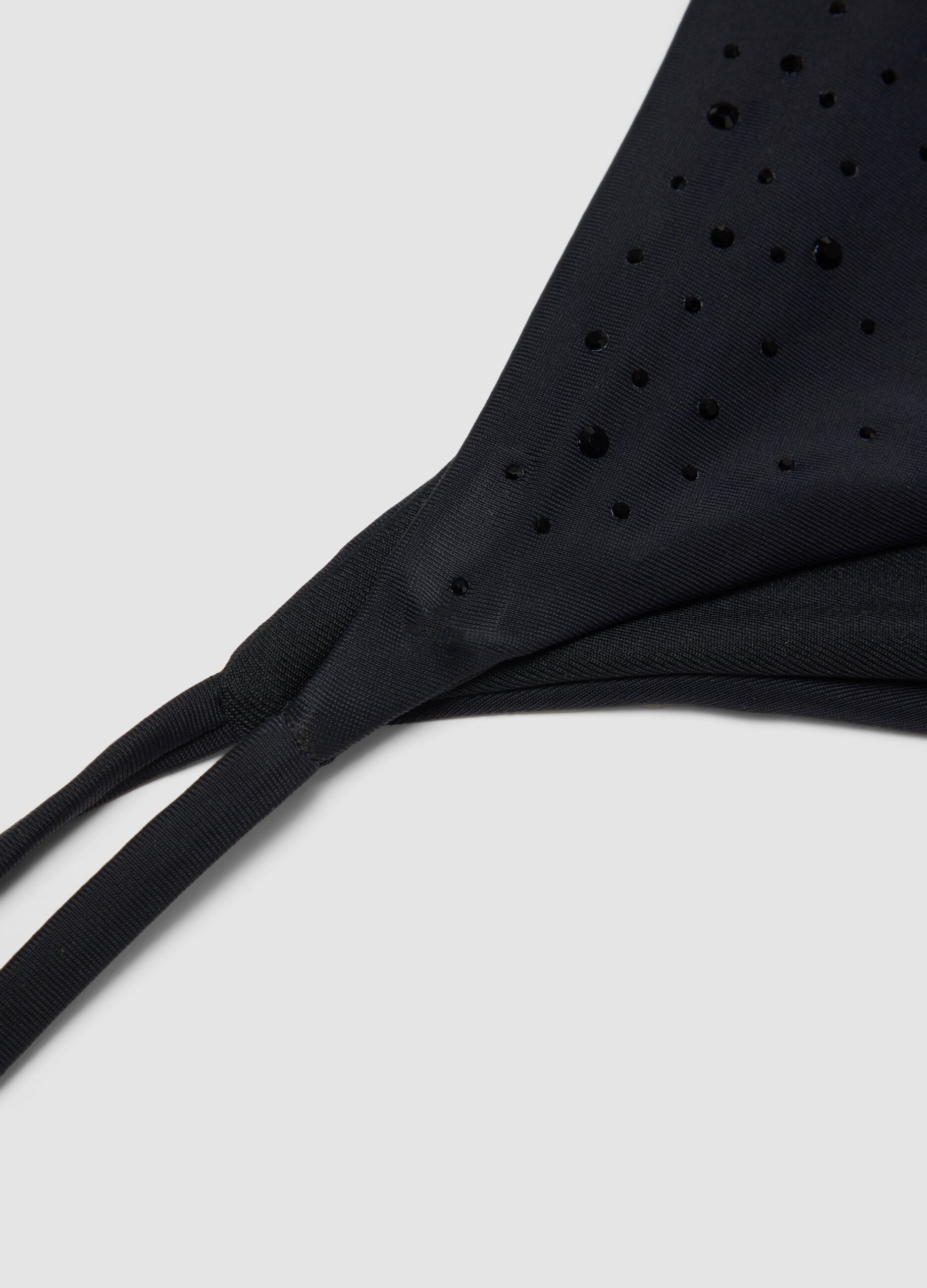 Schwarzes, elastisches Bikinih&ouml;schen mit glitzernden Details