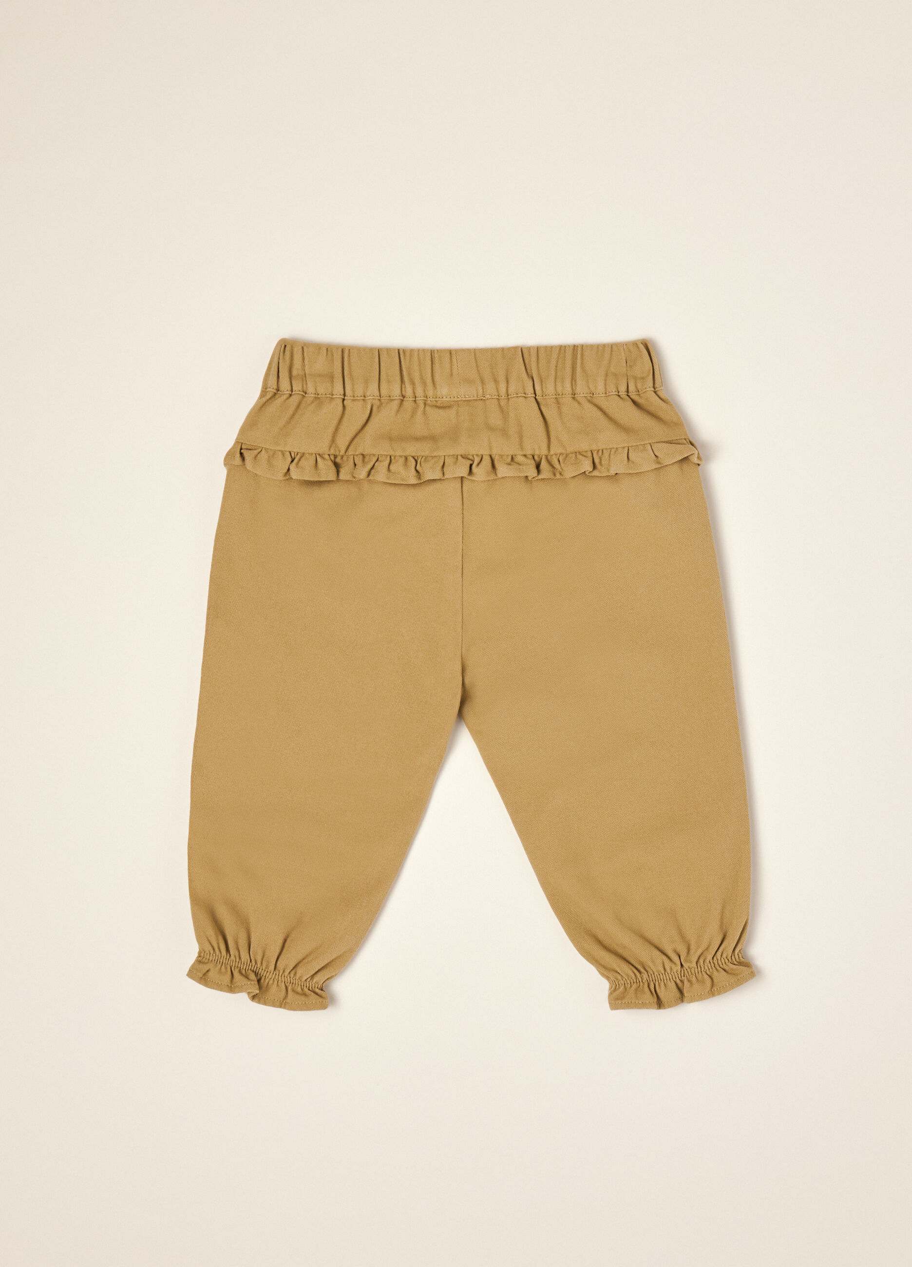 Beige pure cotton trousers with ruffle detail