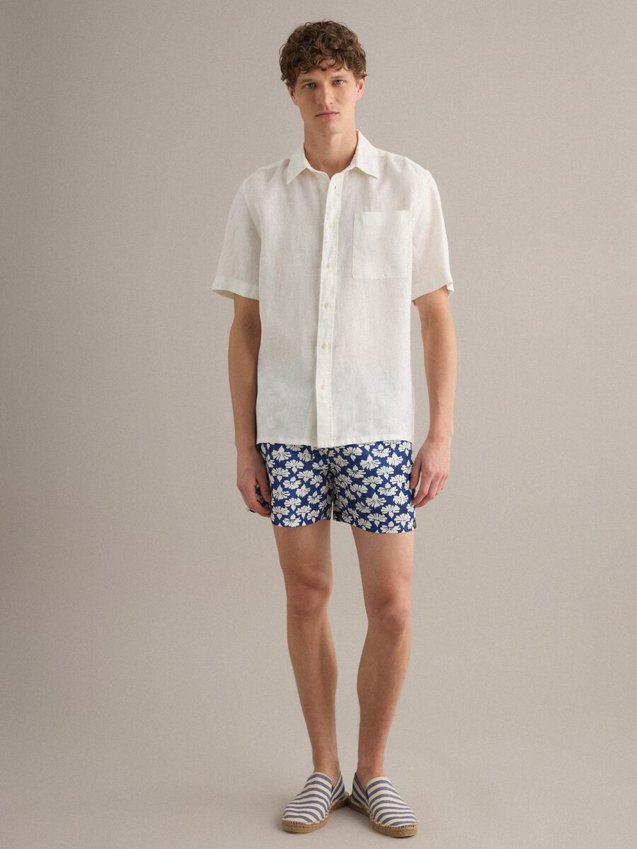 Blue floral-print swim shorts_0